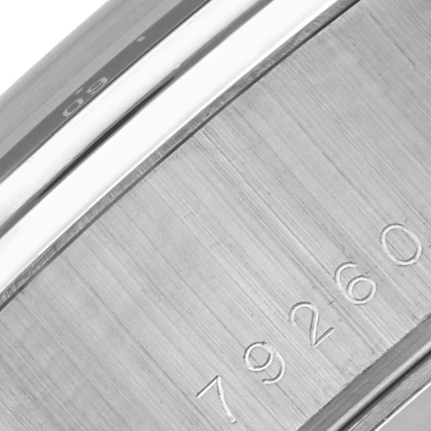 The image shows a close-up of the side of the Tudor Tiger 79260 Men's Stainless Steel Orange Dial 79260 Men's Stainless Steel Orange Dial model watch, focusing on the engraved model number.