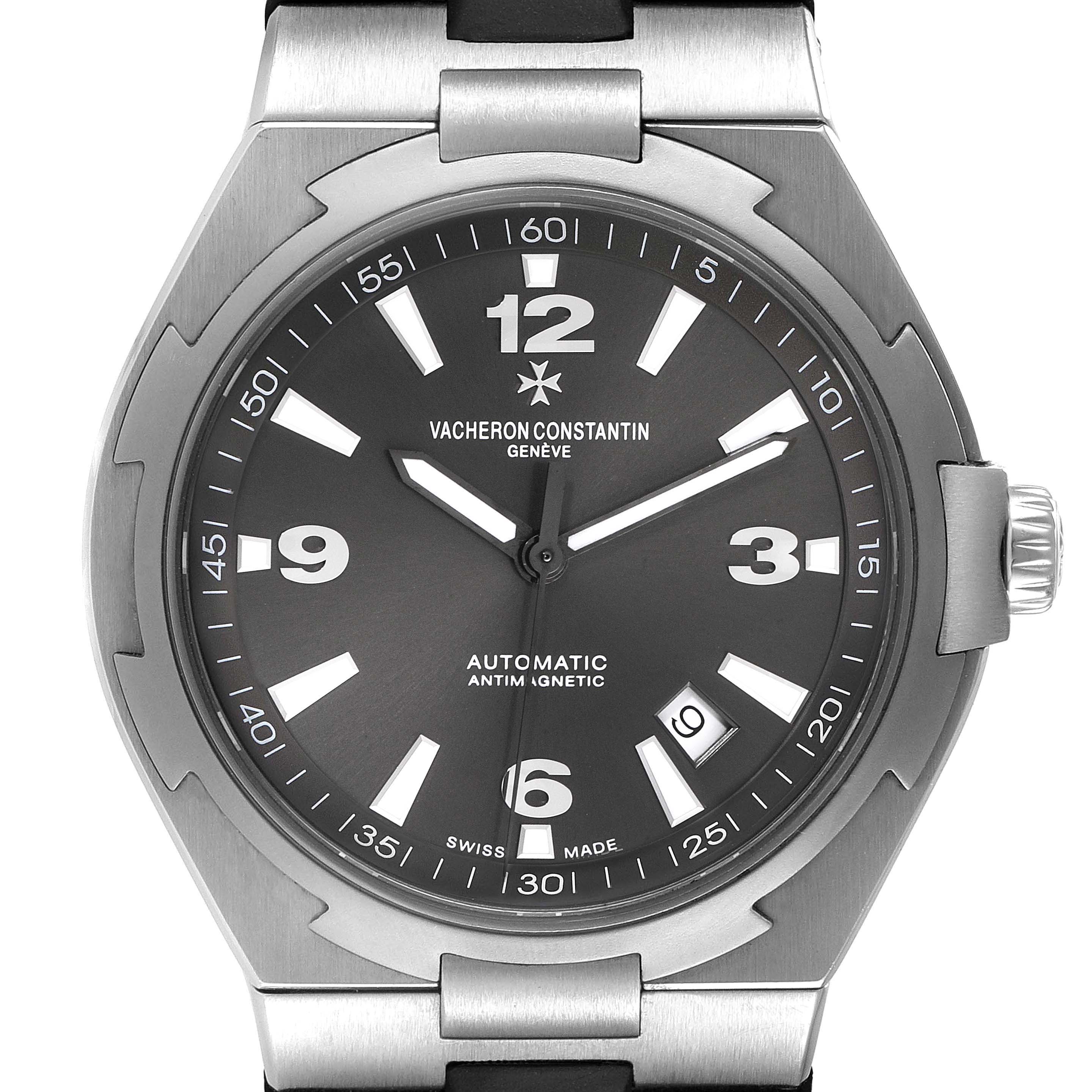 The Vacheron Constantin Overseas 47040 Men's Stainless Steel Grey Dial watch is shown from a front angle, highlighting the dial, bezel, crown, and part of the bracelet.