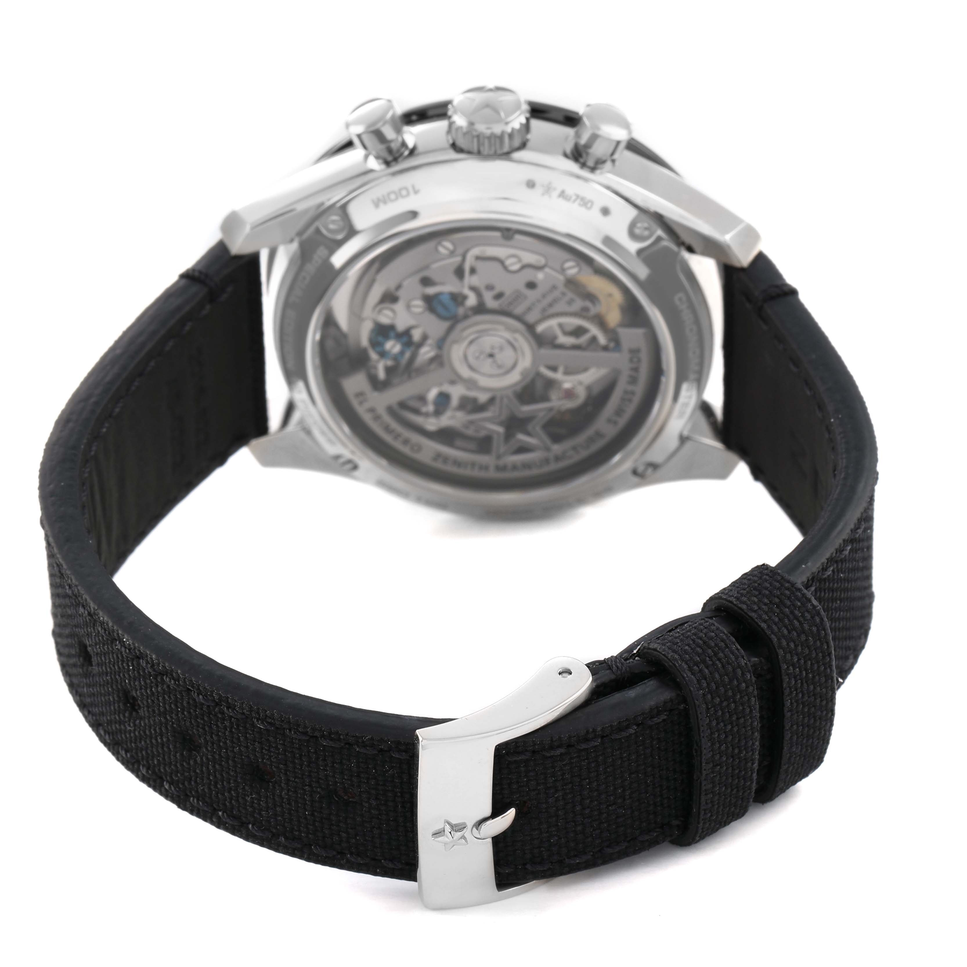 The Zenith Chronomaster 65.3102.3600/01.C920 Men's White Gold Silver Dial watch is shown from the back, displaying its case back and movement, with a black strap and silver buckle.