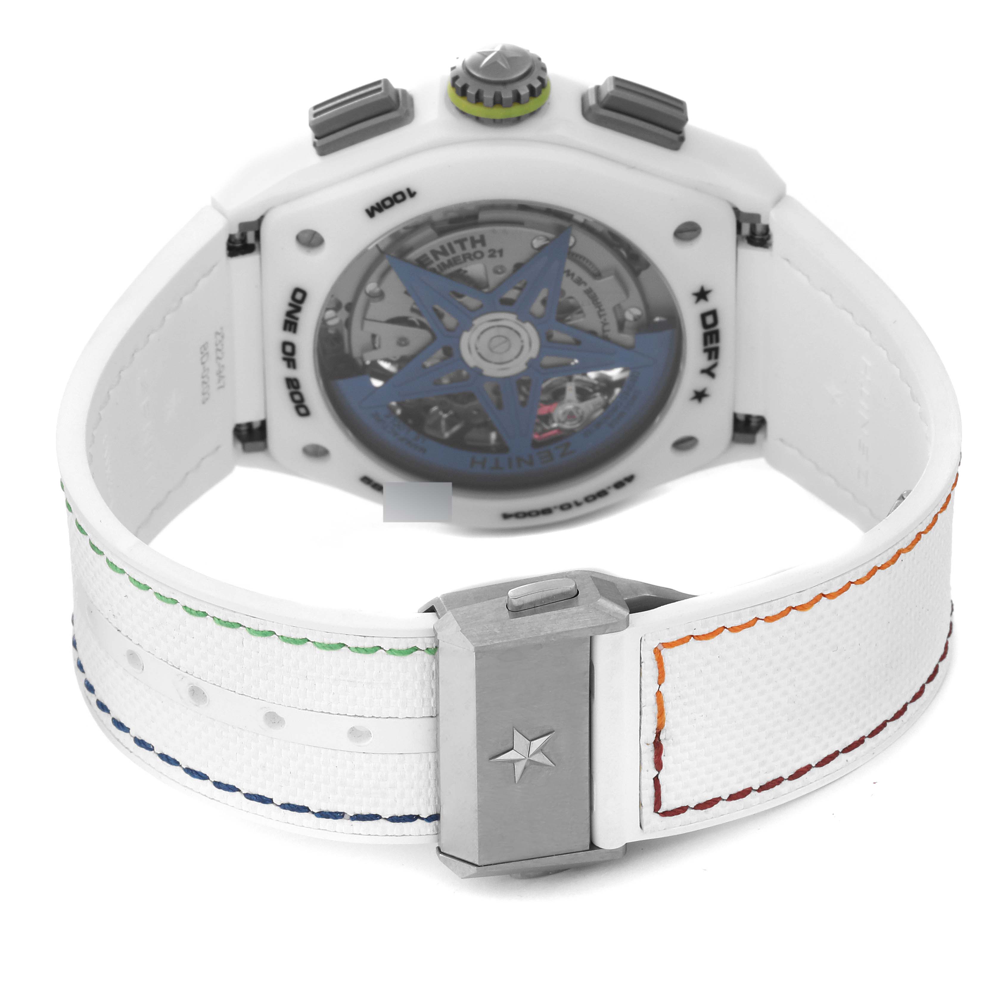 The image shows the back case and strap of a Zenith Defy 49.9010.9004/01.R947 Men's Ceramic White Dial 49.9010.9004/01.R947 Men's Ceramic White Dial watch, highlighting its transparent case back and colorful stitching on the white strap.