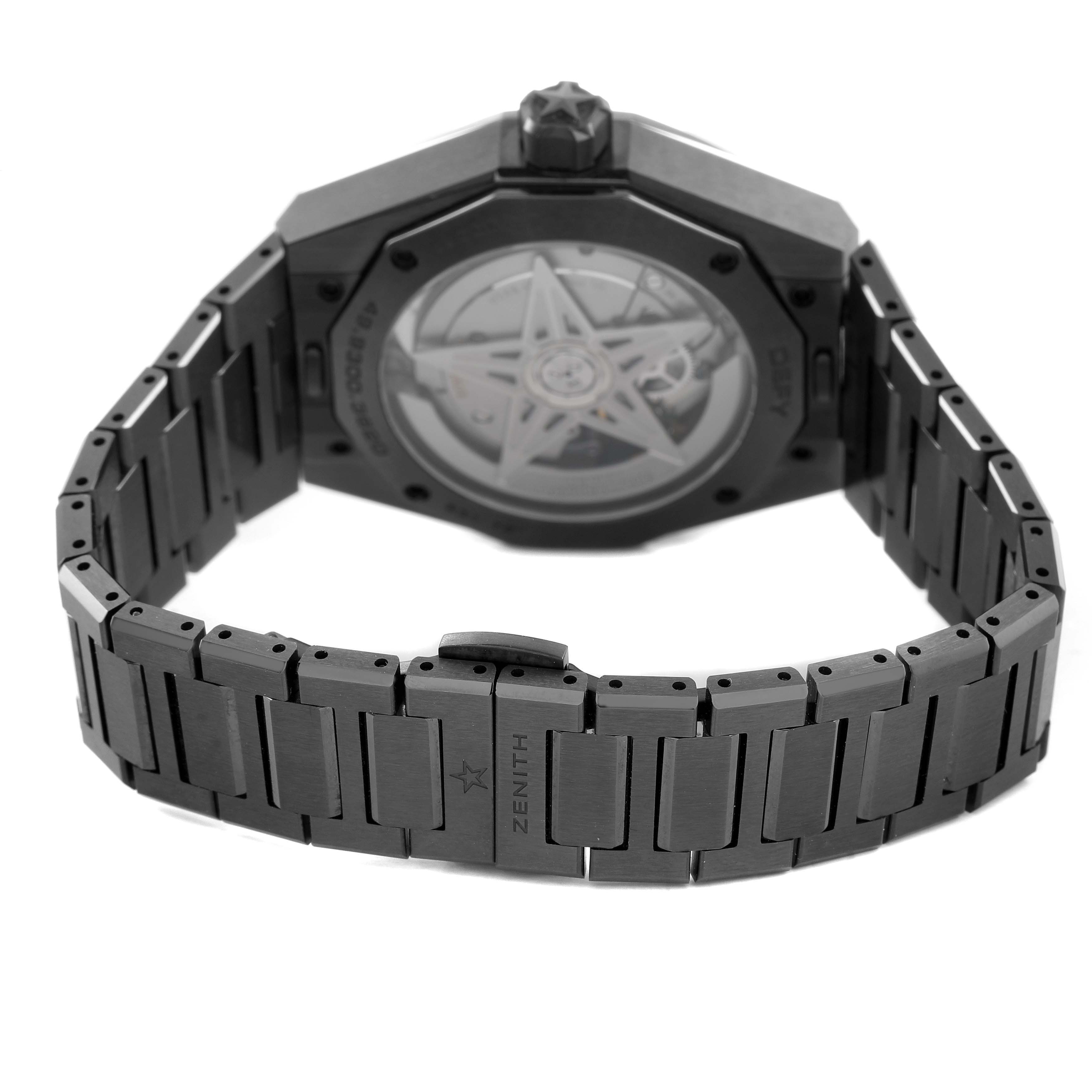 The Zenith Defy Skyline Black Ceramic watch is shown from the back, highlighting the transparent case back and ceramic bracelet.