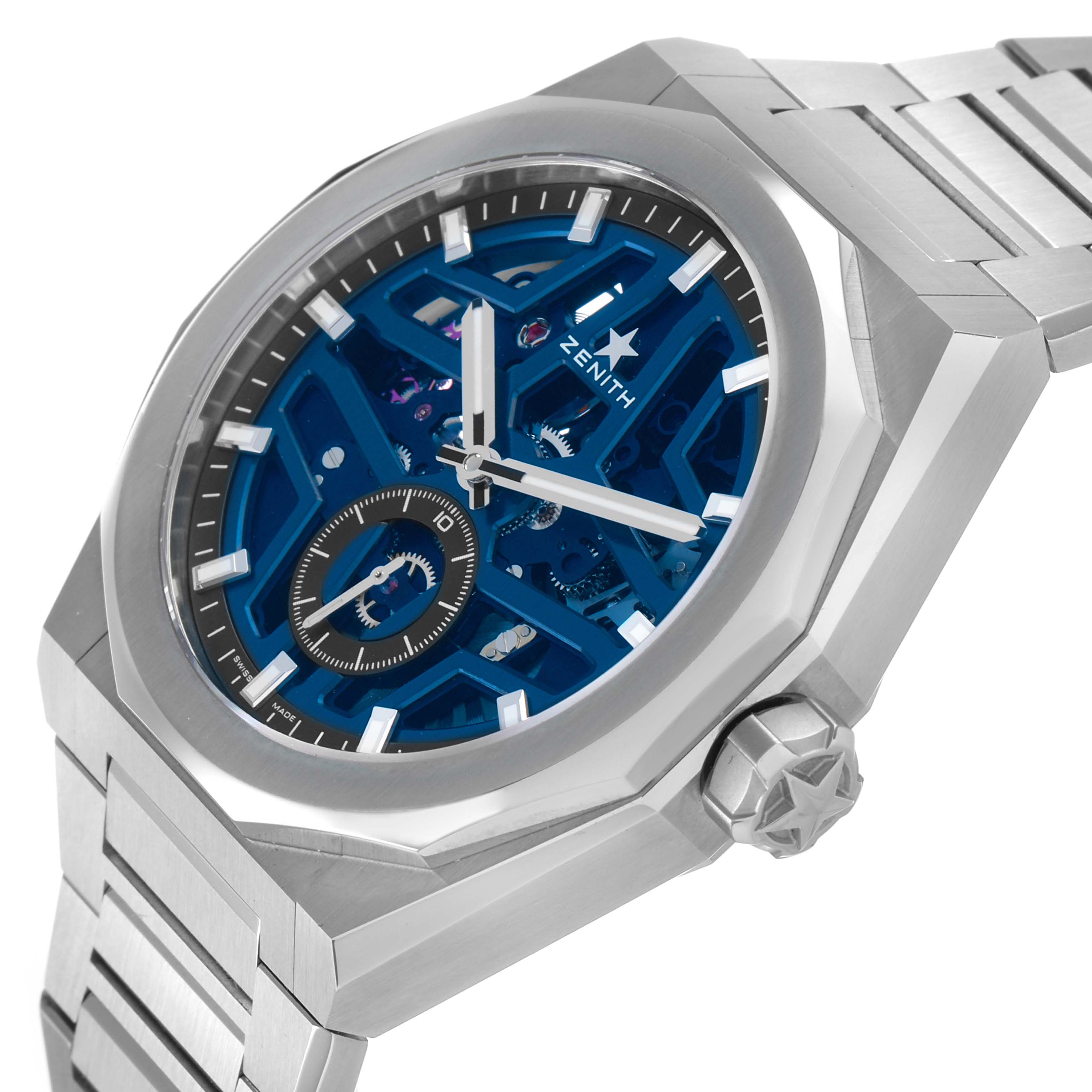 The image shows a Zenith Defy 03.9300.3620 / 79.I001 Men's Stainless Steel Blue Dial watch at an angle highlighting the bezel, dial, bracelet, and crown with a star detail.
