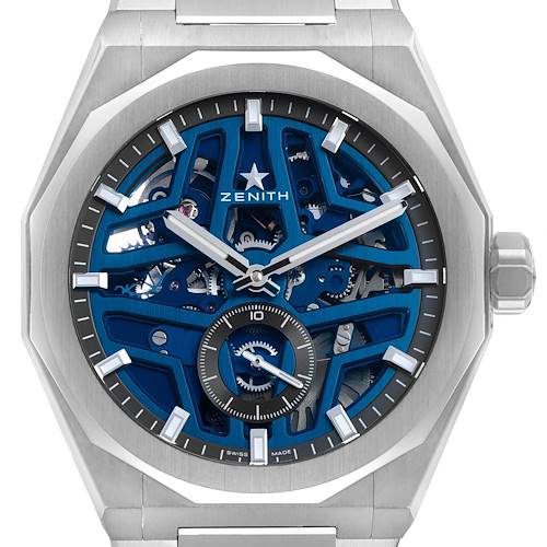 The image shows a front view of the Zenith Defy 03.9300.3620 / 79.I001 Men's Stainless Steel Blue Dial watch, highlighting its intricate, skeletonized dial and mechanical workings.