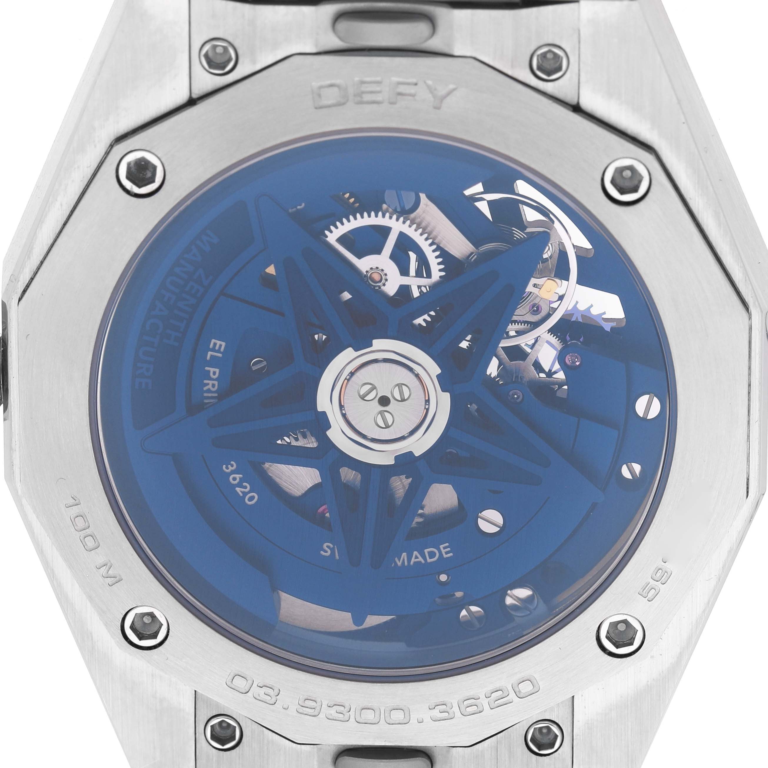 The image shows the back of a Zenith Defy 03.9300.3620 / 79.I001 Men's Stainless Steel Blue Dial watch, highlighting the intricate movement and blue rotor.