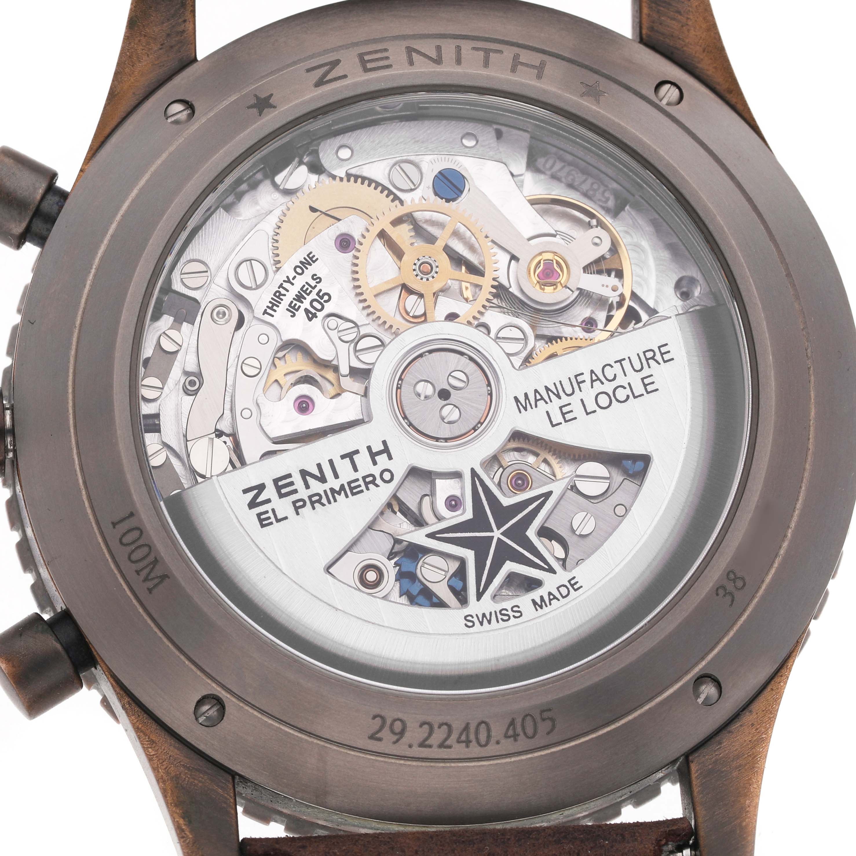 The image shows the back of the Zenith Pilot 29.2240.405 Men's Bronze Brown Dial watch, highlighting its mechanical movement with visible gears and inscriptions.