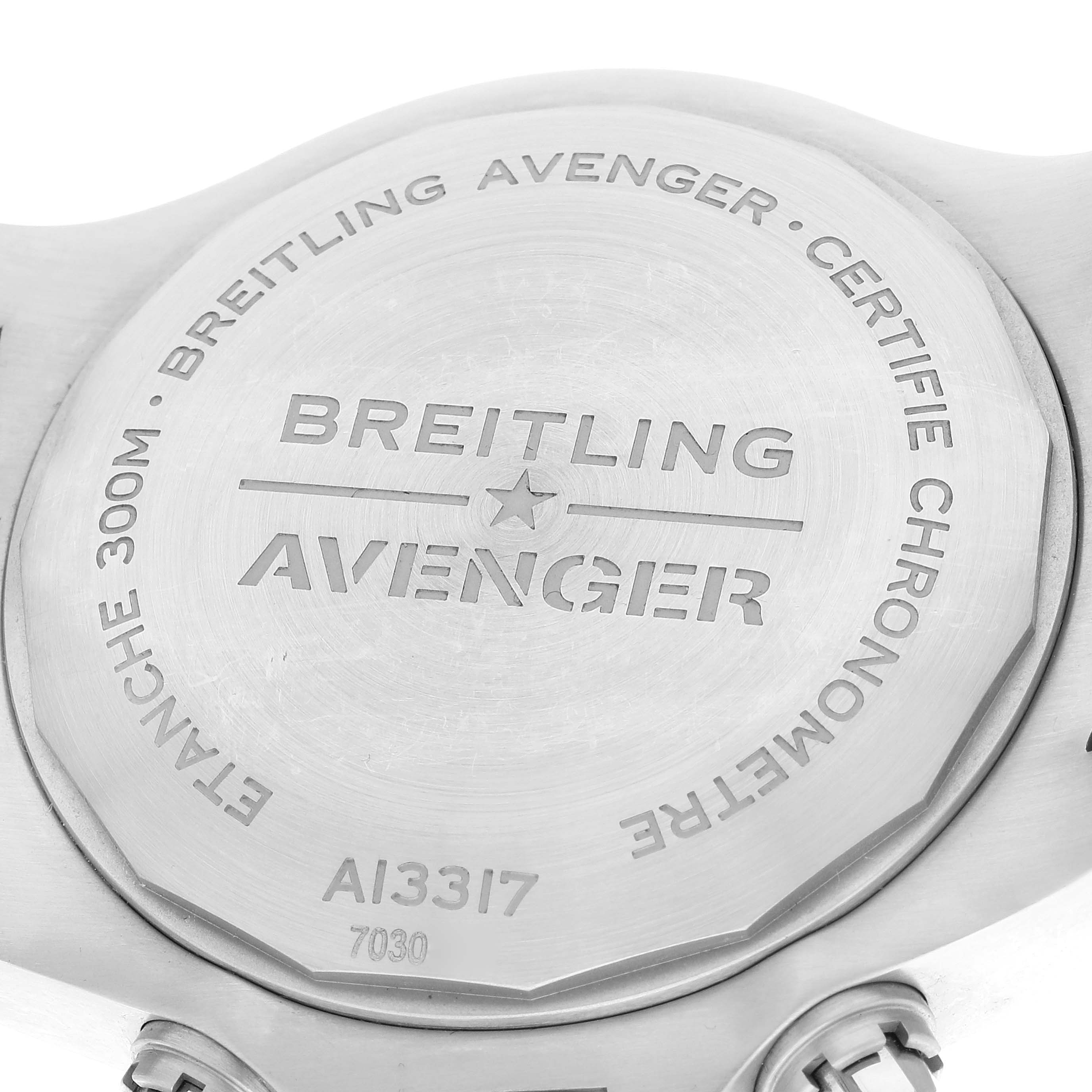 The image shows the back of a Breitling Avenger A13317101B1X1 Men's Stainless Steel Black Dial A13317101B1X1 Men's Stainless Steel Black Dial watch, highlighting the engraved branding and specifications.