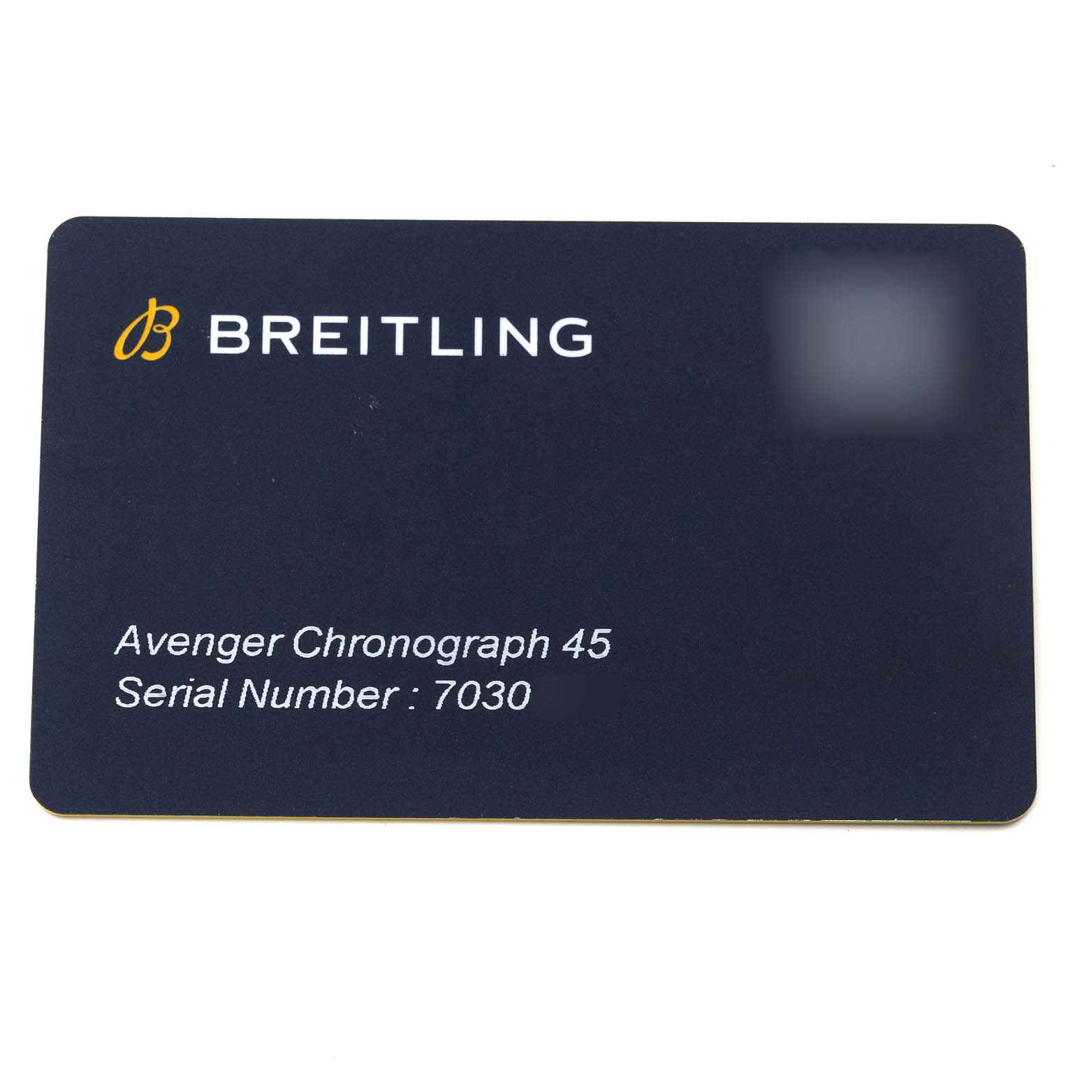 The image shows a warranty card for the Breitling Avenger A13317101B1X1 Men's Stainless Steel Black Dial A13317101B1X1 Men's Stainless Steel Black Dial Chronograph 45, displaying the brand name and serial number.
