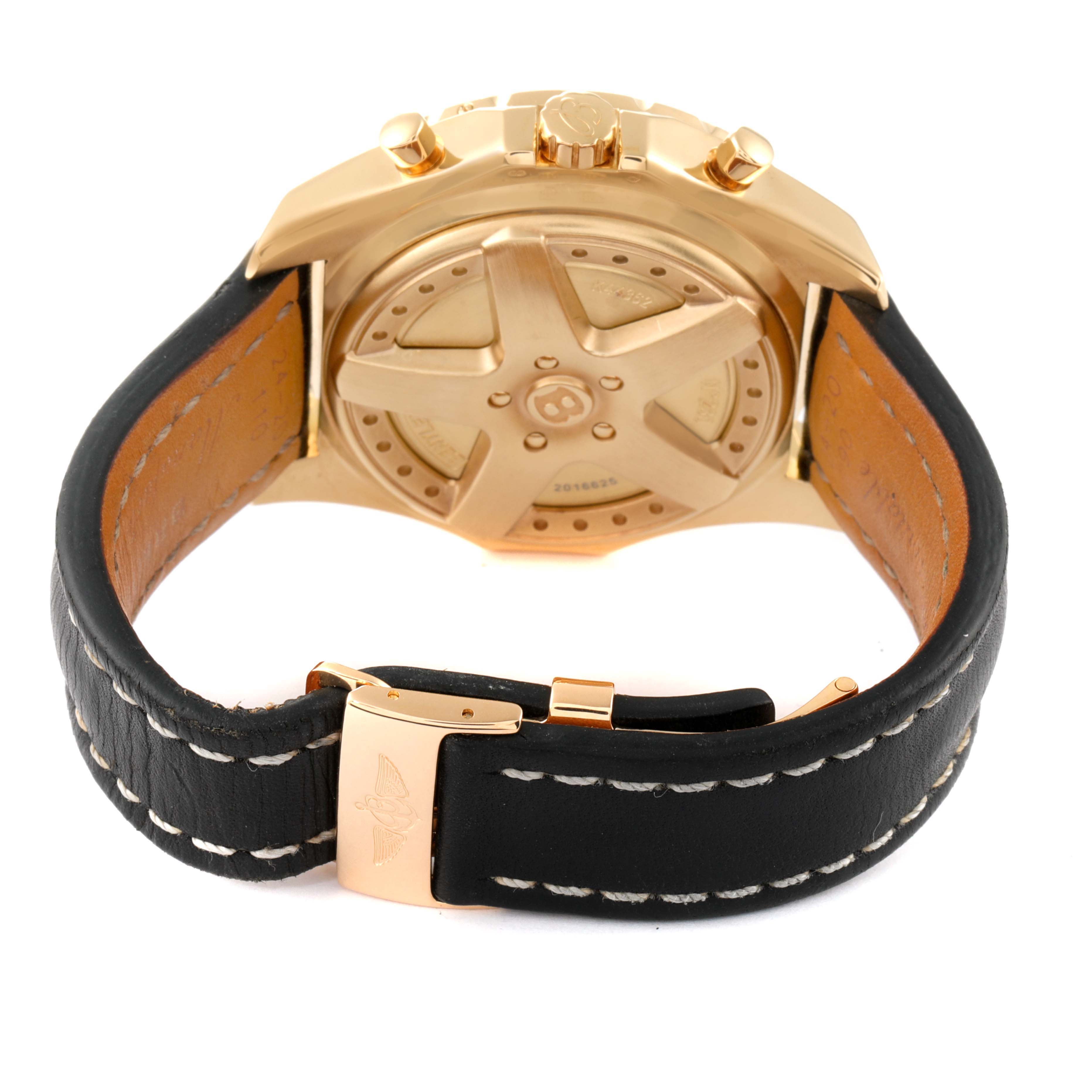 The image shows the back view of the Breitling Bentley K44362 Men's Yellow Gold Silver Dial K44362 Men's Yellow Gold Silver Dial watch, highlighting the case back, leather strap, and clasp.