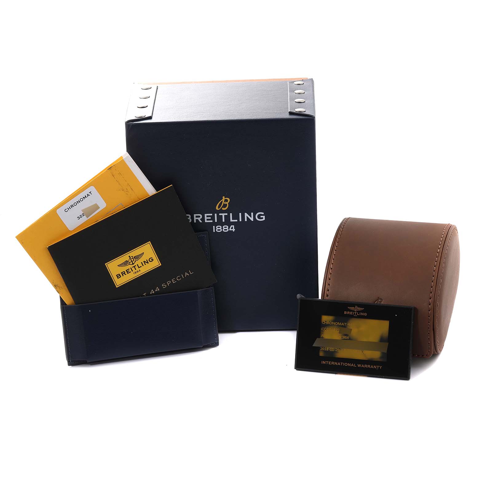 This image shows accessories of the Breitling Chronomat AB0115 Men
s Stainless Steel Blue Dial AB0115 Men
s Stainless Steel Blue Dial model, including manuals, a box, a carry case, and a warranty card.