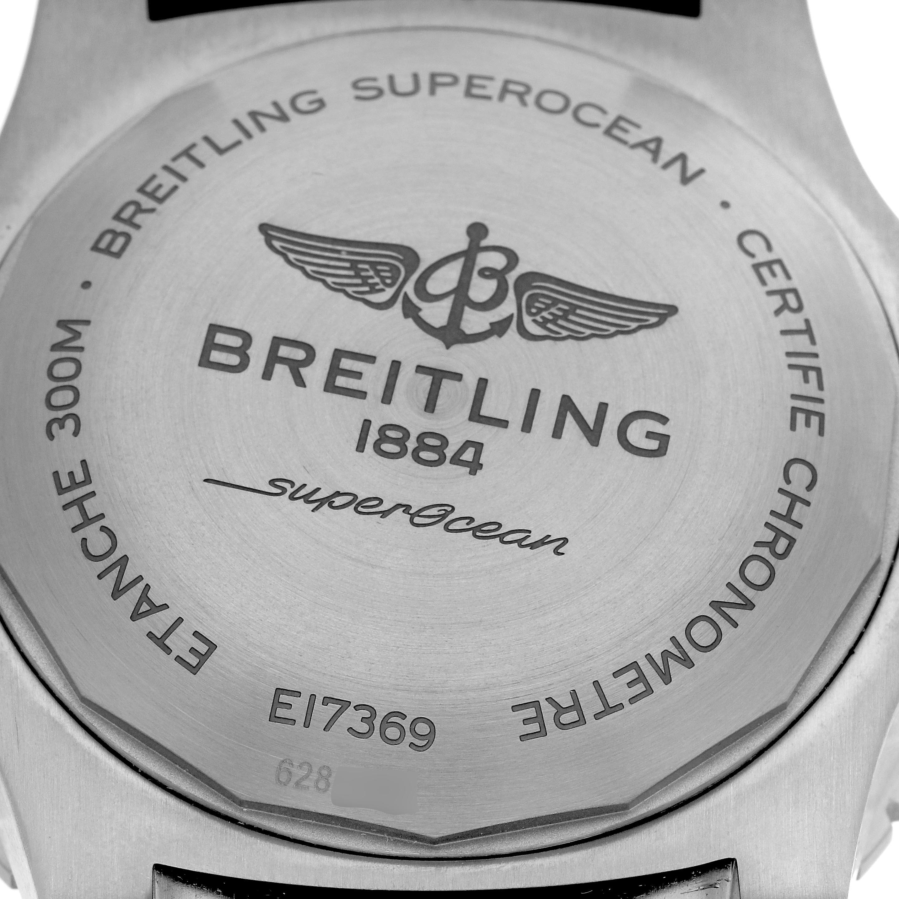 The image shows the back case of a Breitling Superocean E17369 Men's Titanium Yellow Dial E17369 Men's Titanium Yellow Dial watch, displaying the brand's logo and model details.