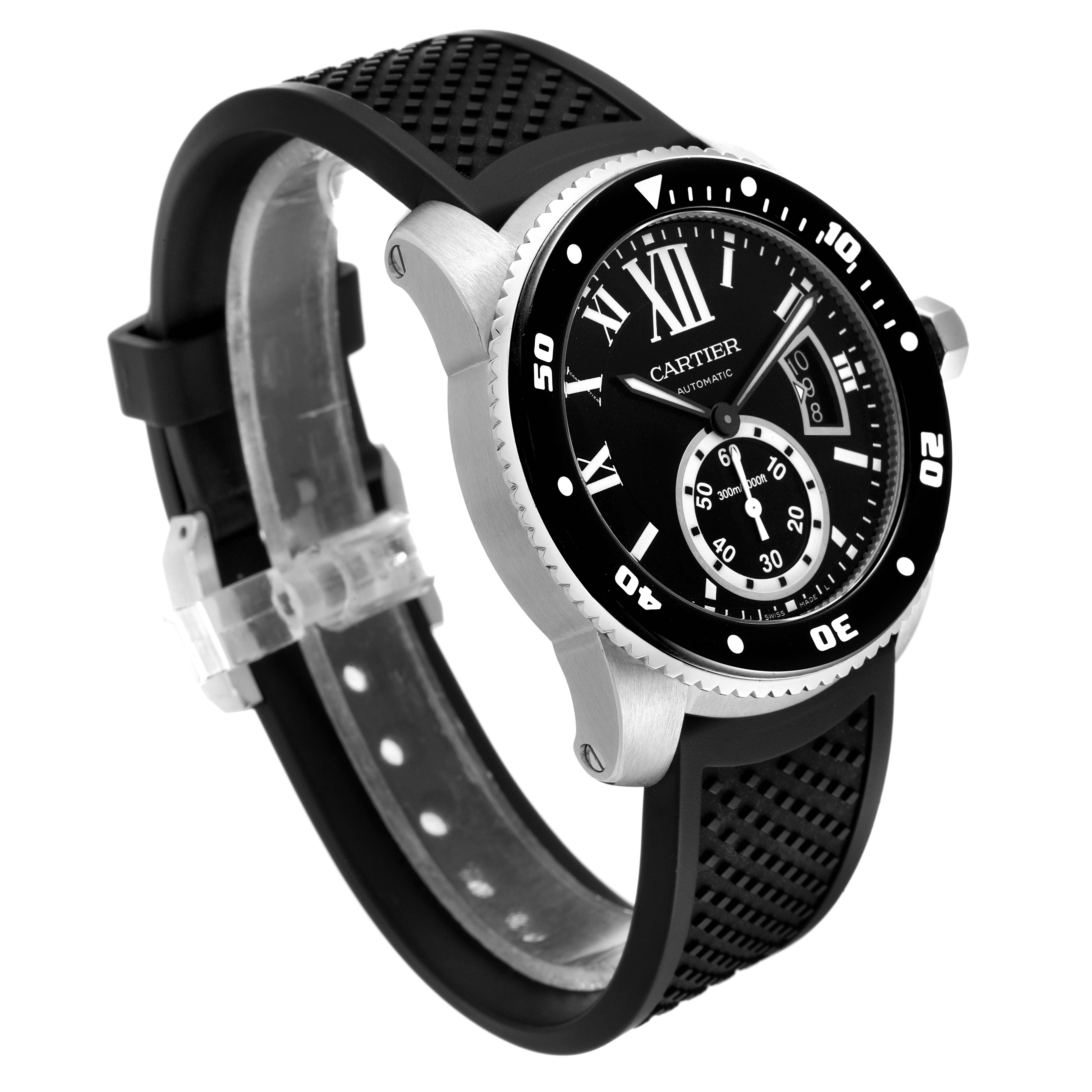 The image shows a side view of the Calibre de Cartier watch by Cartier, highlighting its round face, black dial, and black rubber strap.