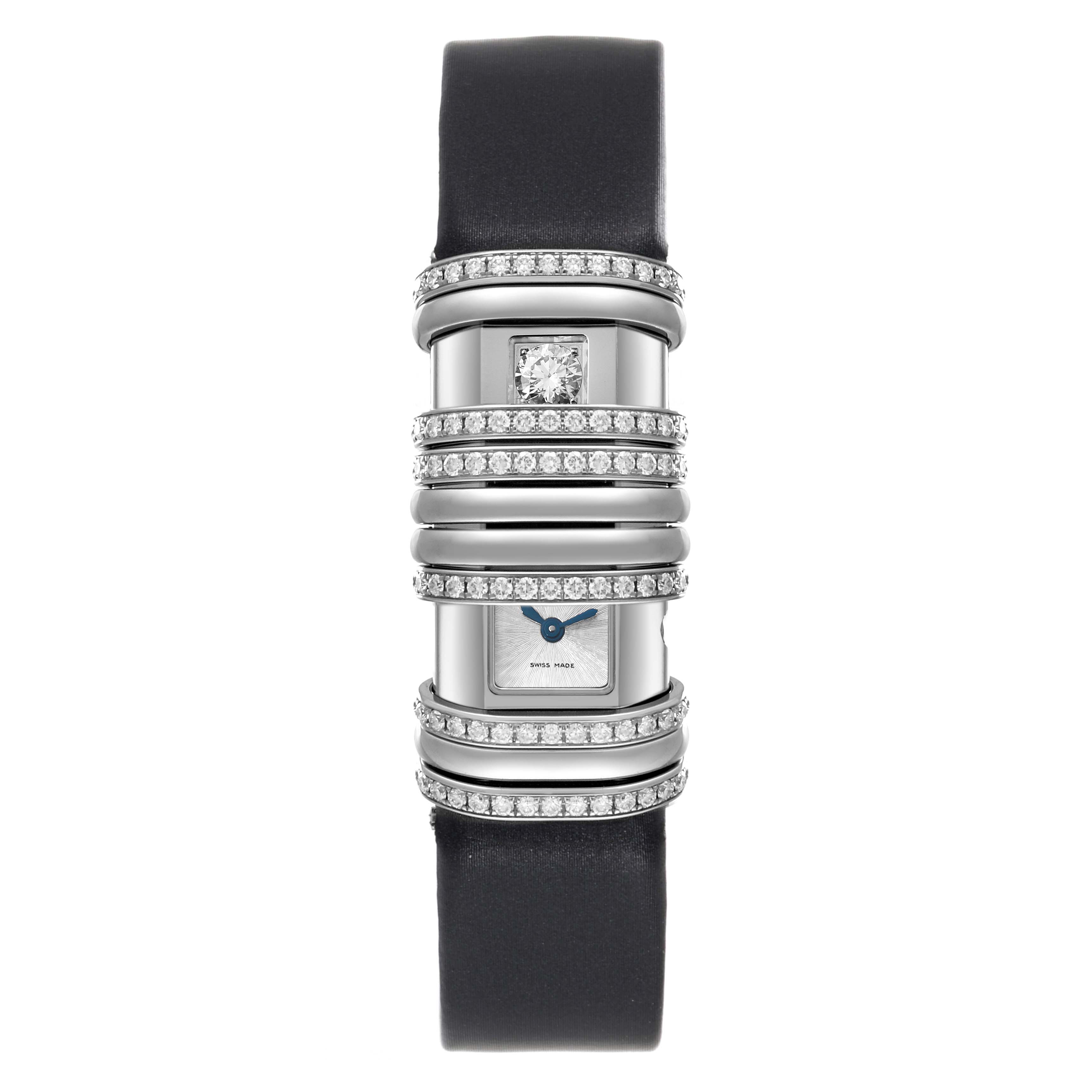 The image shows the front view of the Cartier Declaration WT000450 Women's Titanium Silver Dial WT000450 Women's Titanium Silver Dial model watch with a jeweled bezel and a black leather strap.