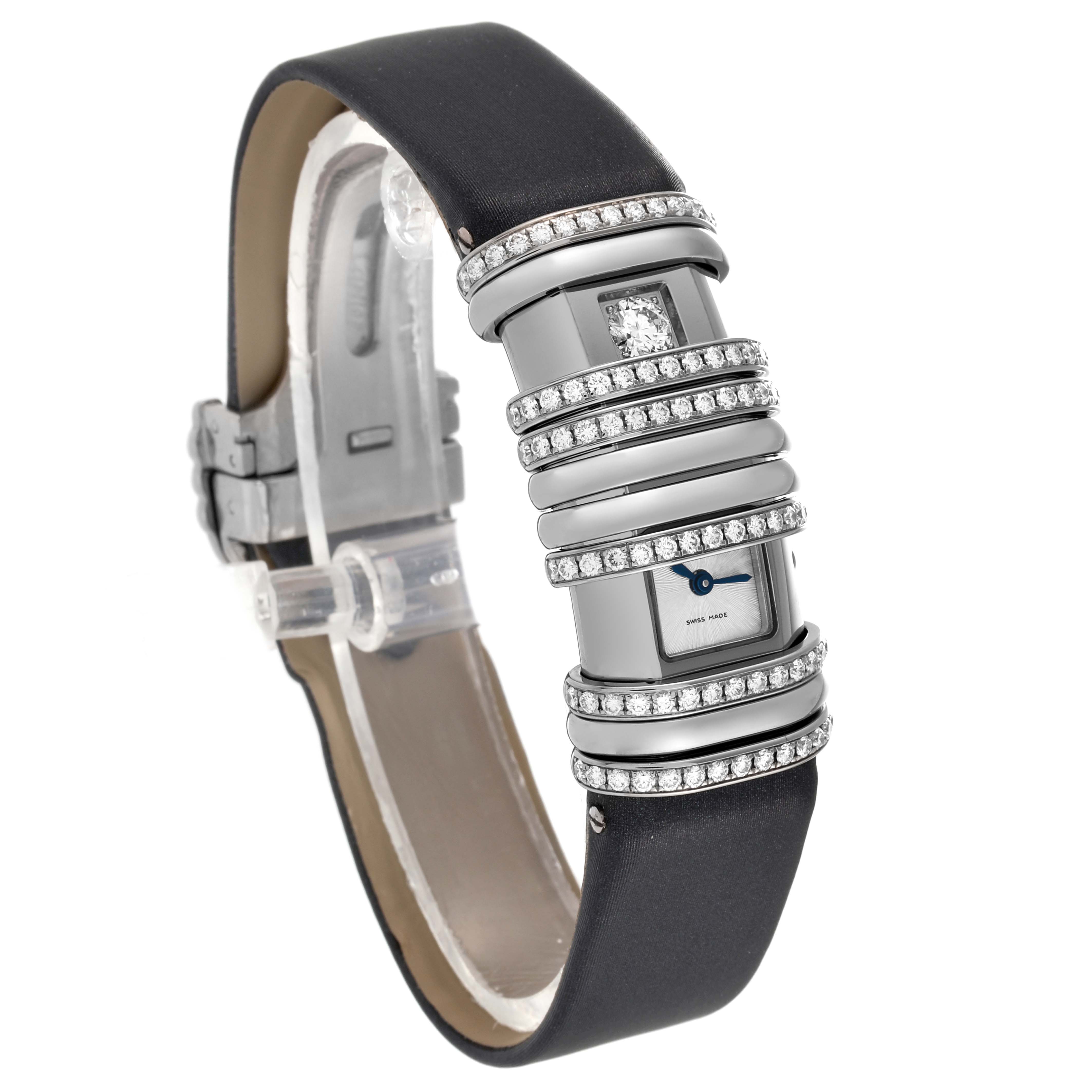 The Cartier Declaration WT000450 Women's Titanium Silver Dial WT000450 Women's Titanium Silver Dial watch is shown at an angled perspective, highlighting its diamond-set bezel and black leather strap.