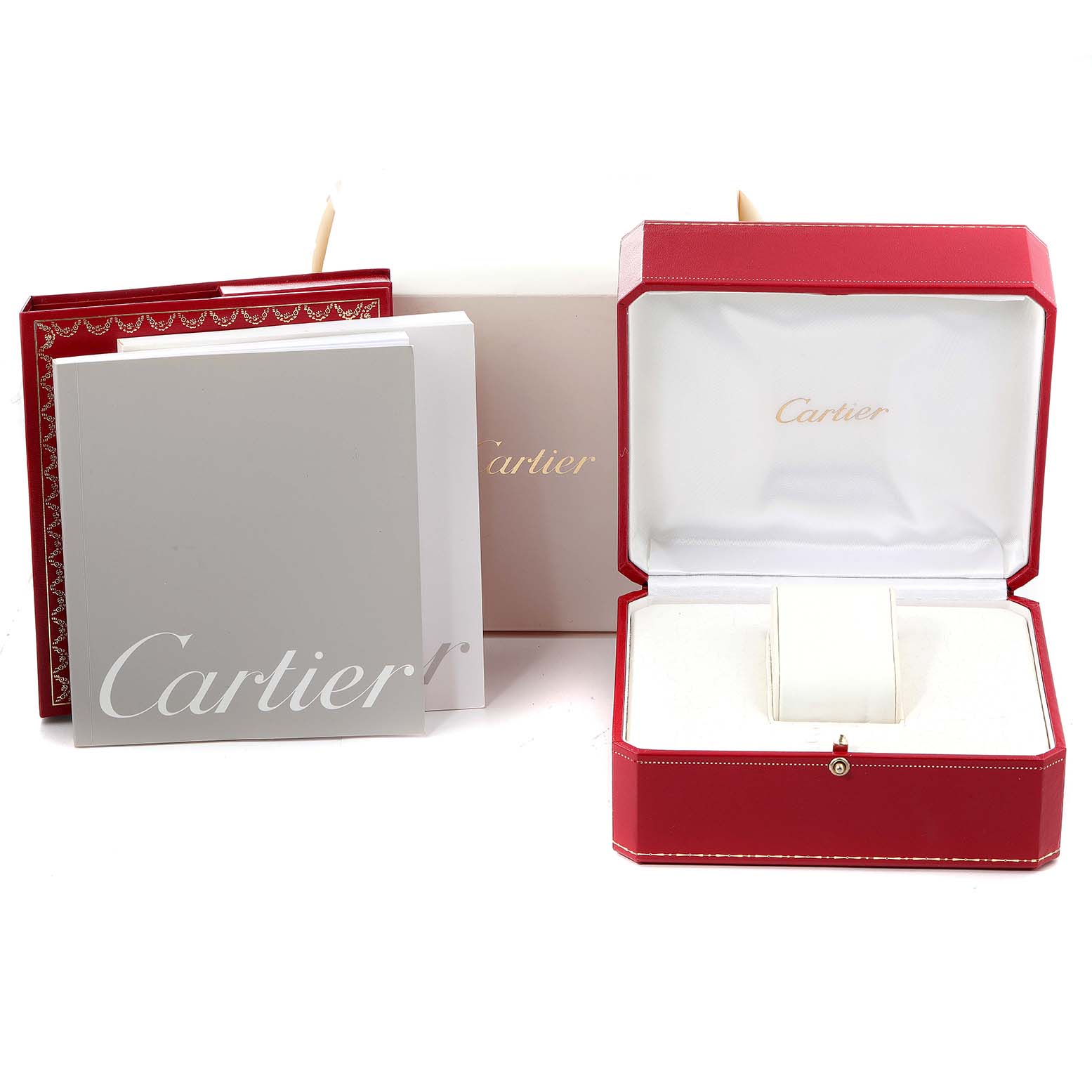 The image shows the packaging, manuals, and the empty watch box for the Cartier Pasha W31058M7 Women
s Stainless Steel Pink Dial W31058M7 Women
s Stainless Steel Pink Dial model, viewed from the front.