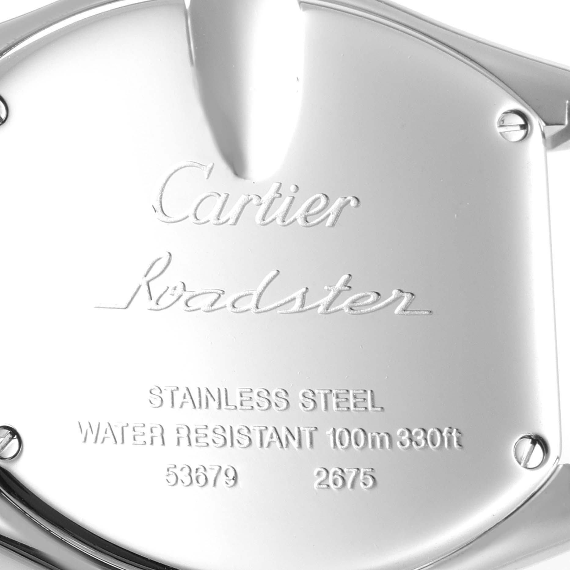 This image shows the back casing of a Cartier Roadster W62016V3 Women's Stainless Steel Silver Dial W62016V3 Women's Stainless Steel Silver Dial watch, highlighting its engravings and metal texture.