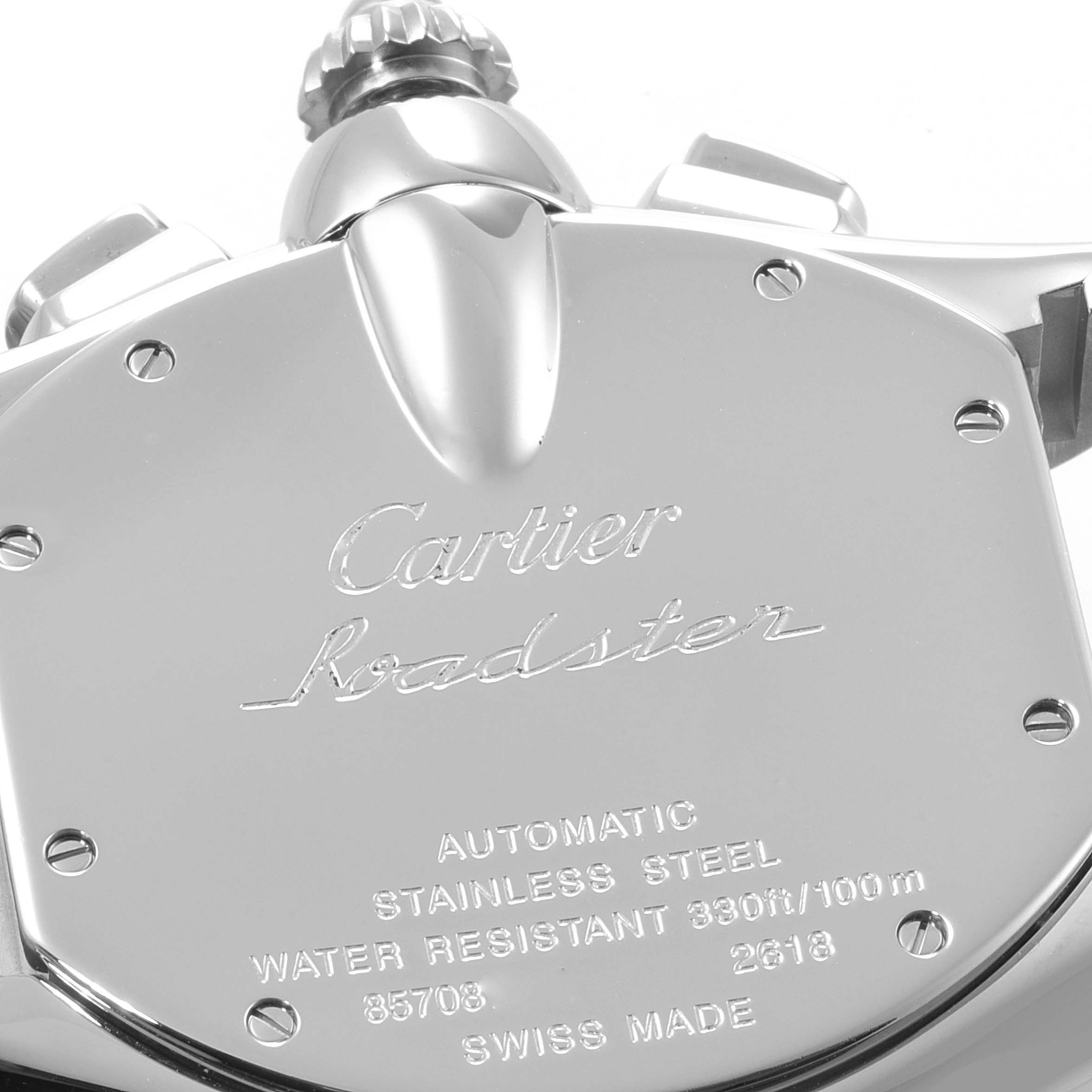 The image shows the back case of a Cartier Roadster W62020X6 Men
s Stainless Steel Black Dial W62020X6 Men
s Stainless Steel Black Dial watch, highlighting its engravings and stainless steel construction.
