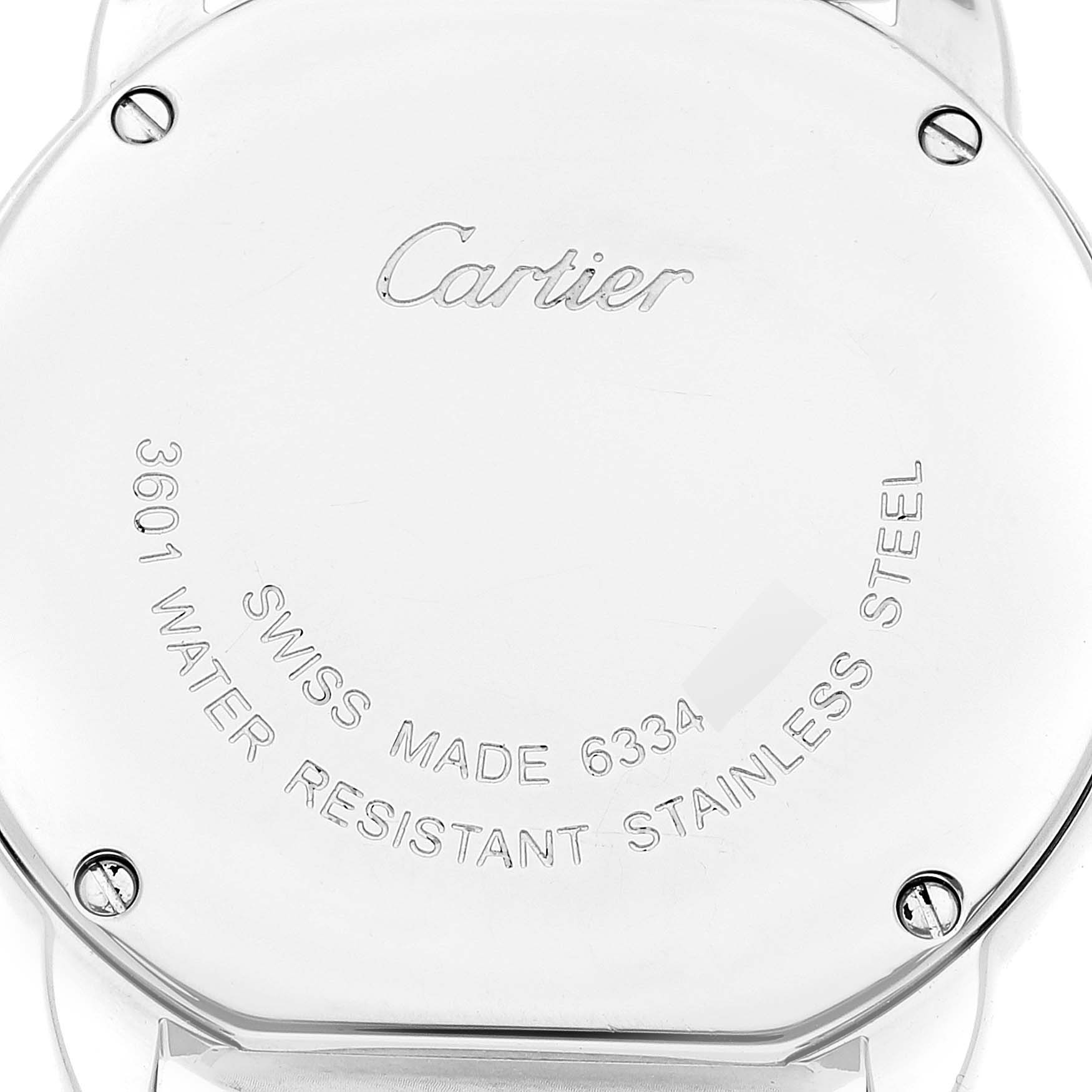This image shows the back case of a Cartier Ronde W6701004 Women's Stainless Steel Silver Dial W6701004 Women's Stainless Steel Silver Dial watch, highlighting the engravings and screws.