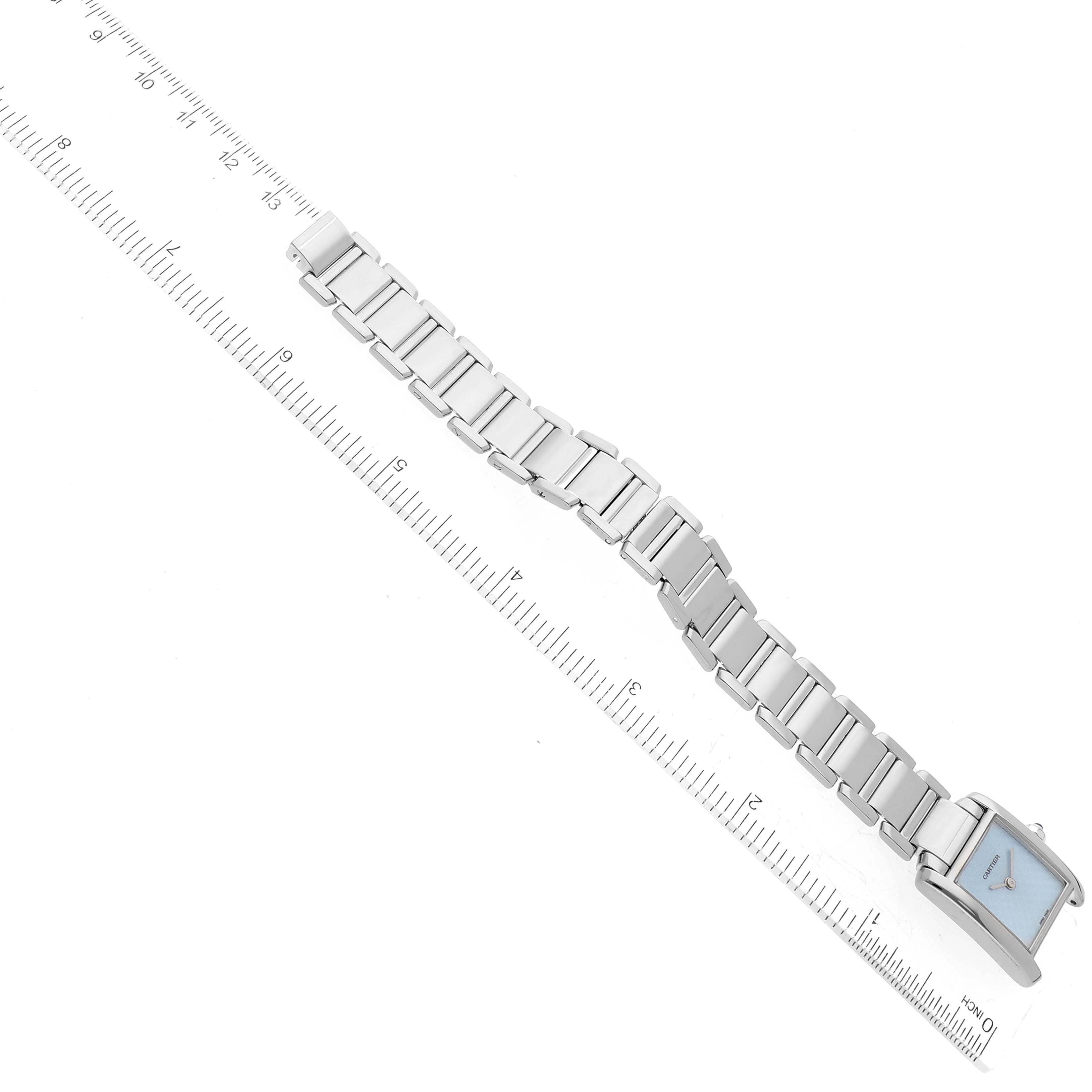 The image shows a top-down view of the Cartier Tank Française watch, highlighting the full length of the bracelet and the face.