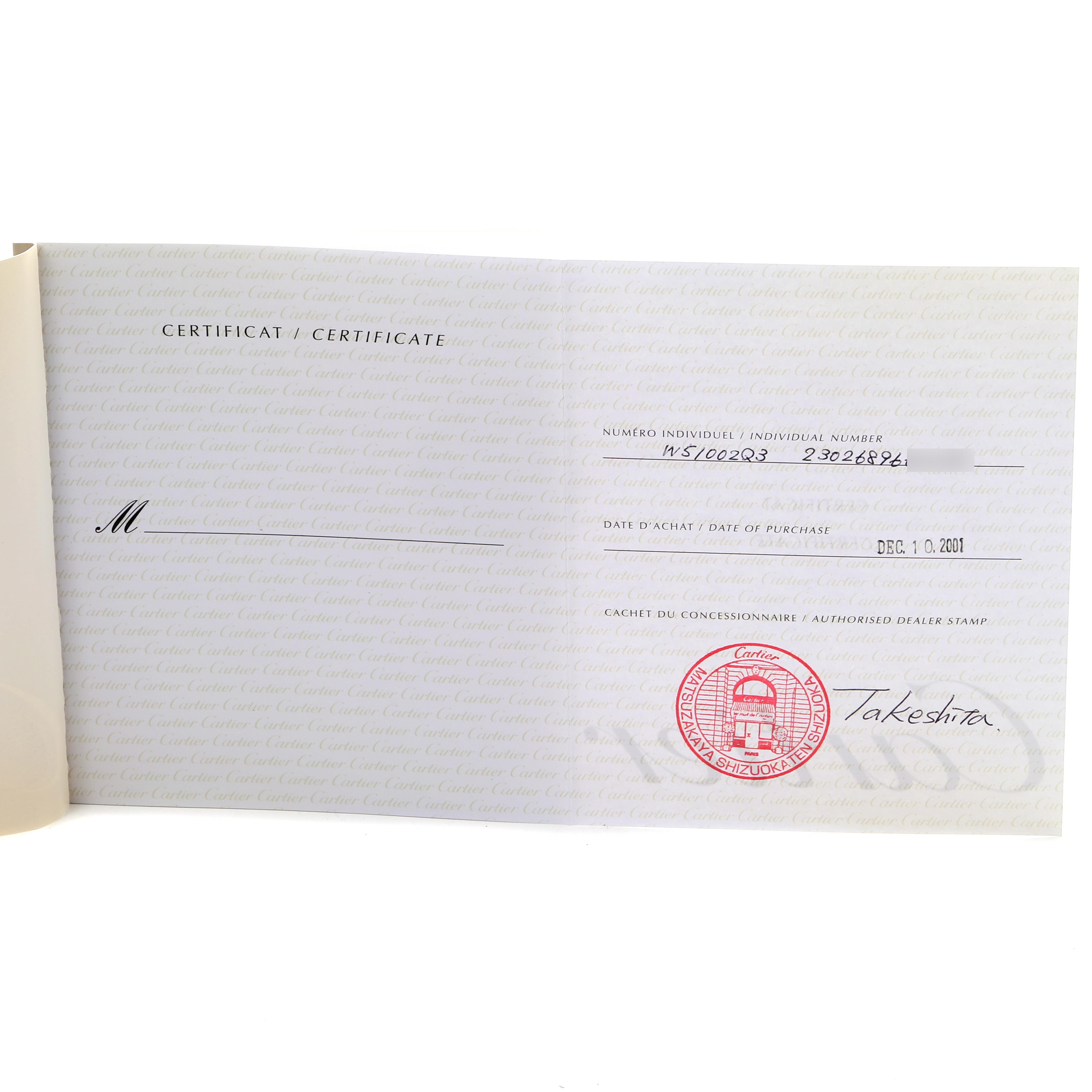 The image shows an open certificate for a Cartier Tank Française watch, featuring a stamp and purchase date.