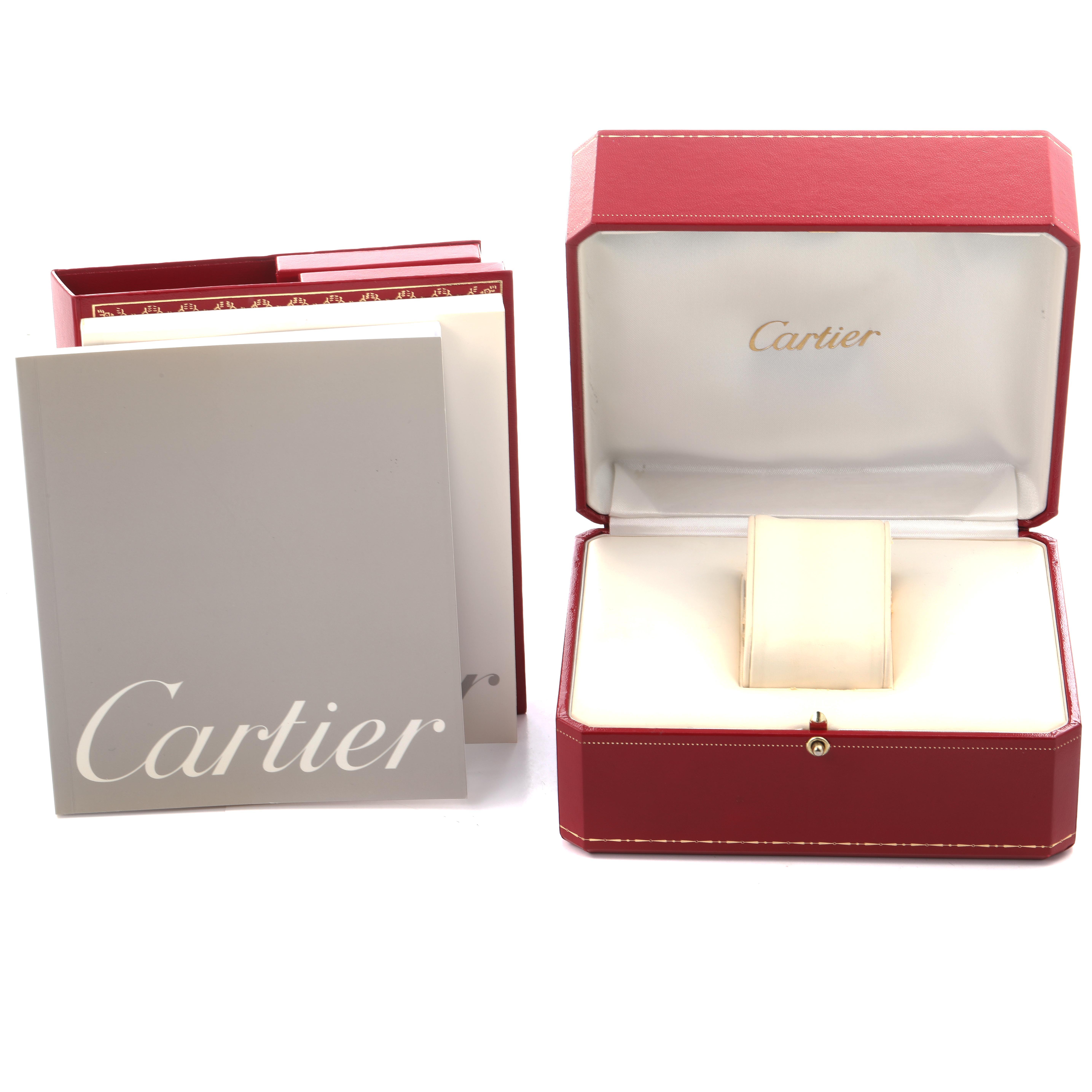 The image shows the packaging and documentation for the Cartier Tank Française, featuring a red box and branded booklet.