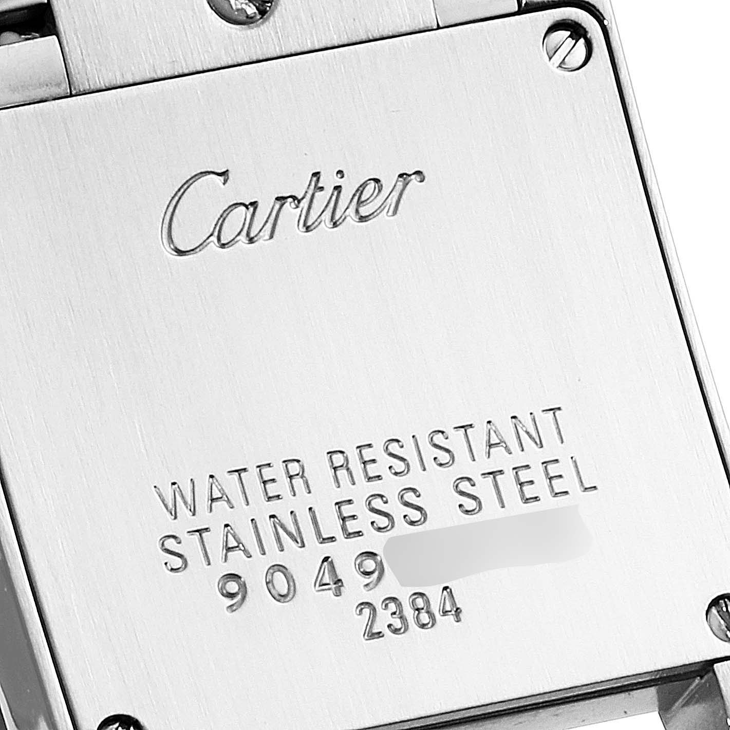 The image shows the back case of a Cartier Tank Française watch, displaying the branding and water resistance information.