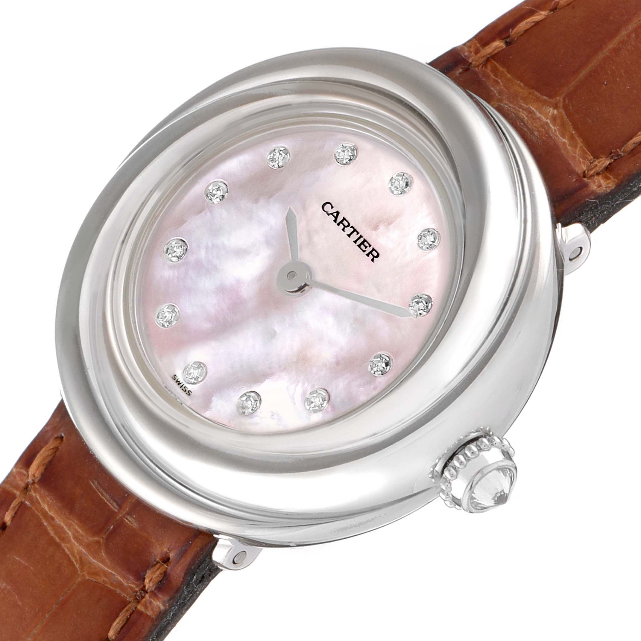 This image shows a Cartier Trinity WG200846 Women's White Gold Mother of Pearl Dial WG200846 Women's White Gold Mother of Pearl Dial model watch from an angled top view, highlighting the face, bezel, crown, and part of the brown leather strap.