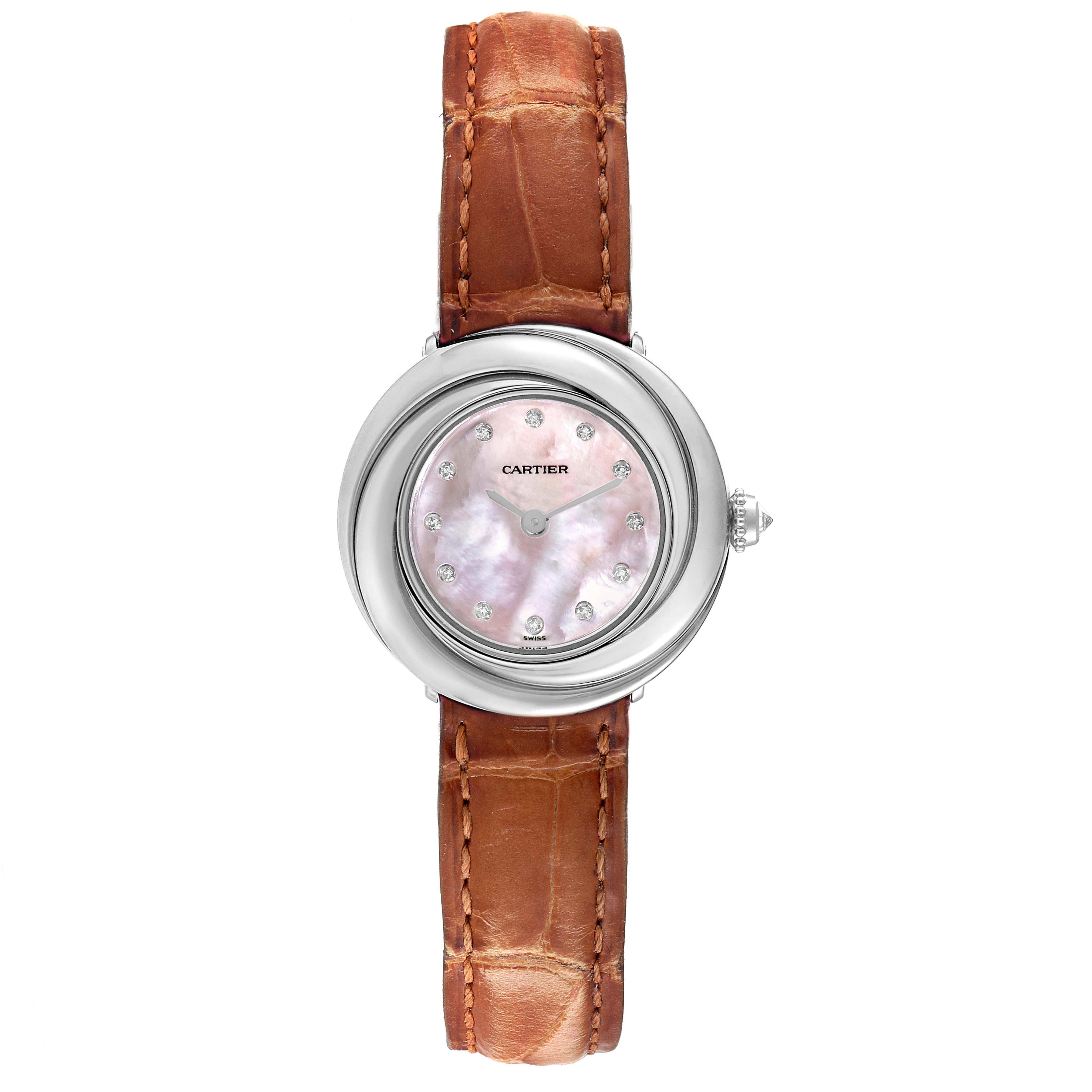 The Cartier Trinity WG200846 Women's White Gold Mother of Pearl Dial WG200846 Women's White Gold Mother of Pearl Dial model watch is shown from a top-down angle, featuring a brown leather strap and a round face with diamond hour markers.