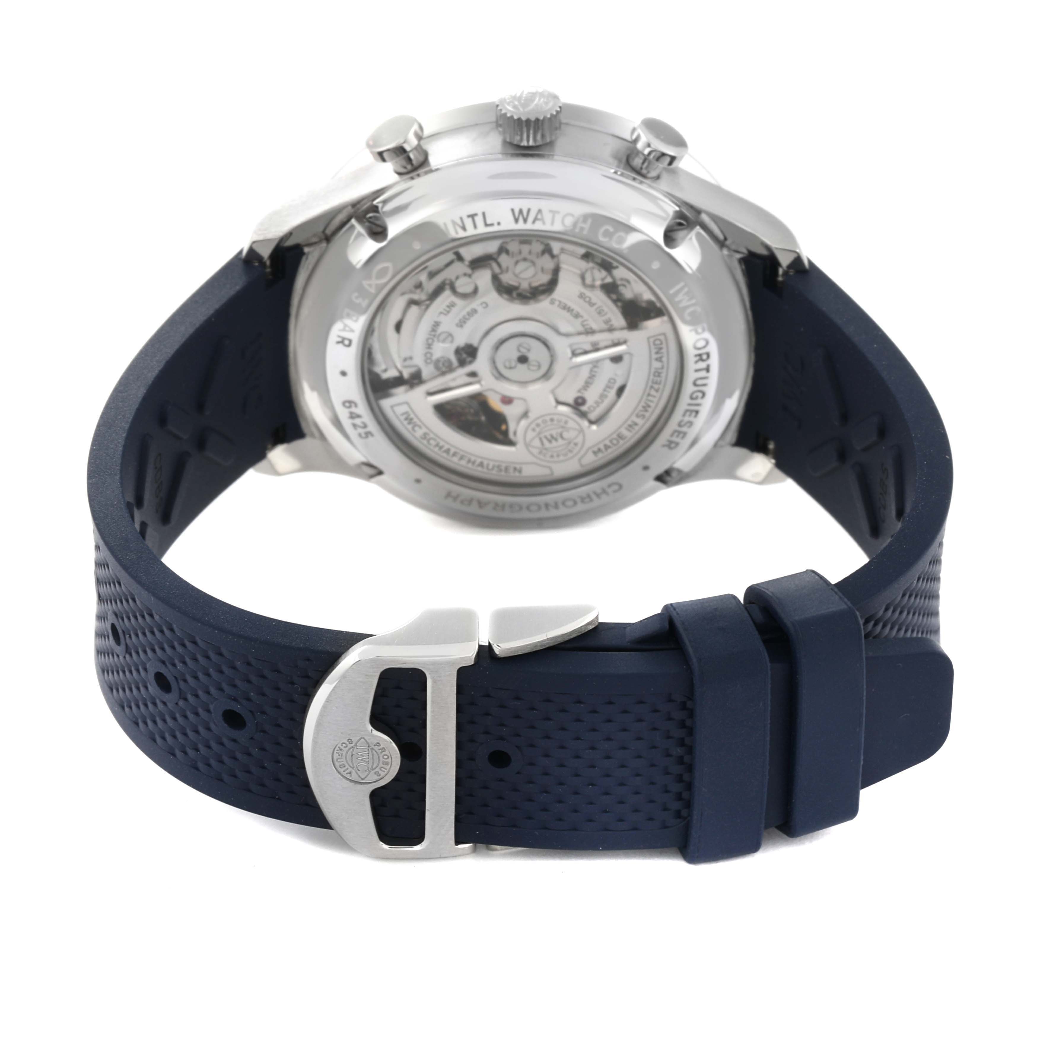 The image shows the back view of an IWC Portuguese IW371620 Men's Stainless Steel White Dial IW371620 Men's Stainless Steel White Dial model watch, highlighting its movement and blue strap with a buckle.