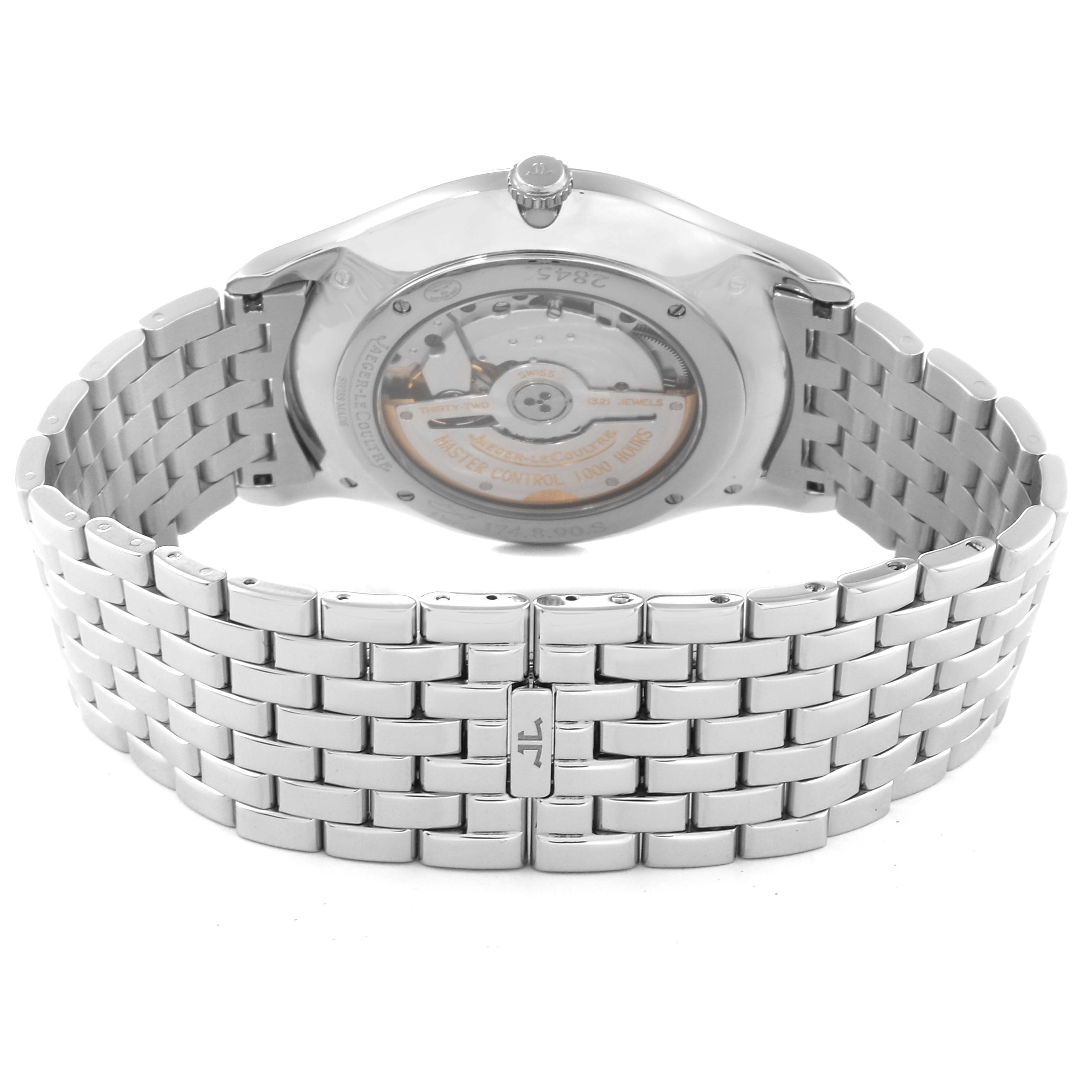 The image shows the back view of a Jaeger LeCoultre Master Q1358420 Men's Stainless Steel Silver Dial Q1358420 Men's Stainless Steel Silver Dial model watch, highlighting the stainless steel bracelet and exhibition case back.