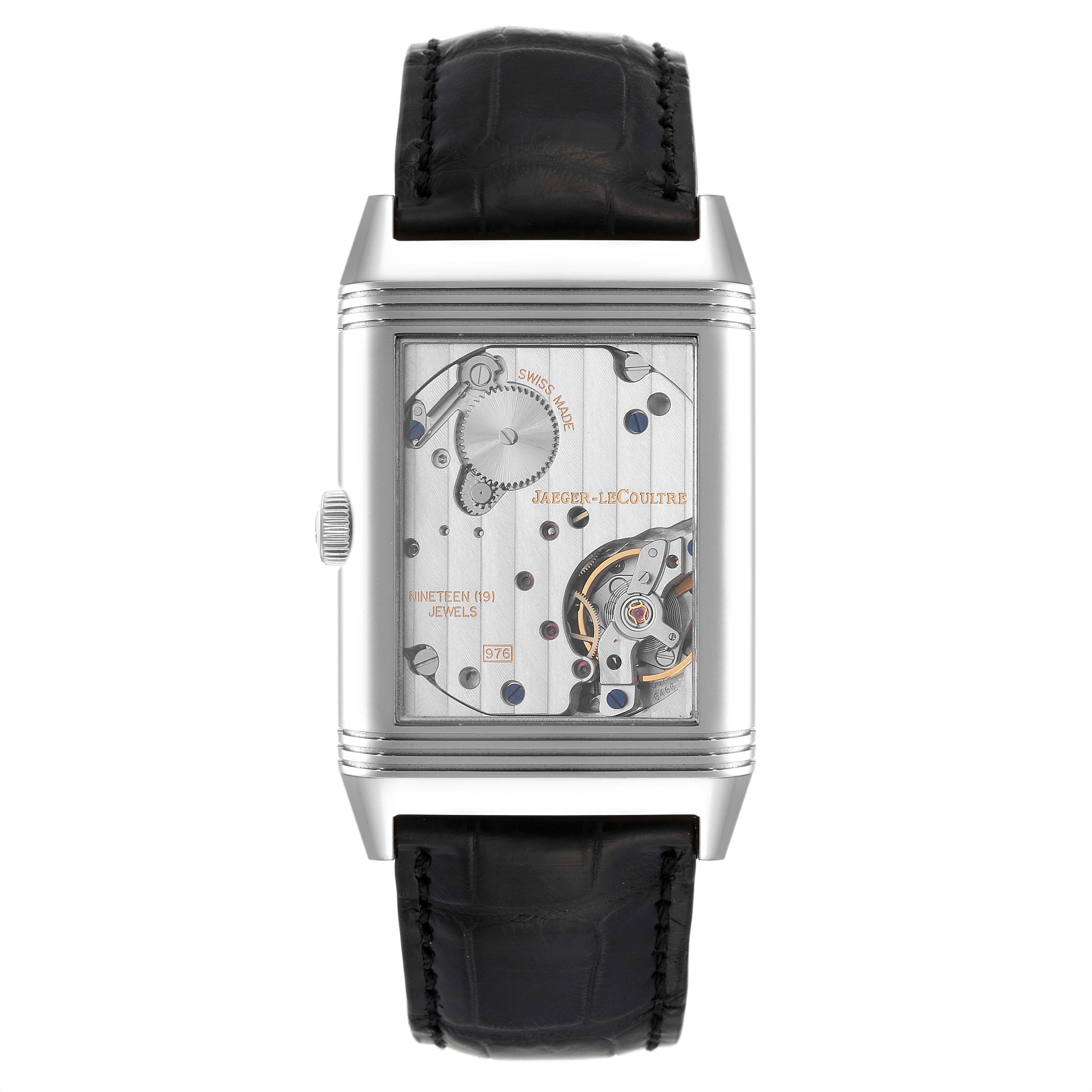 The image shows a frontal view of a Jaeger LeCoultre Reverso Q3738420 Men's Stainless Steel Silver Dial Q3738420 Men's Stainless Steel Silver Dial watch, highlighting its internal mechanical movement.