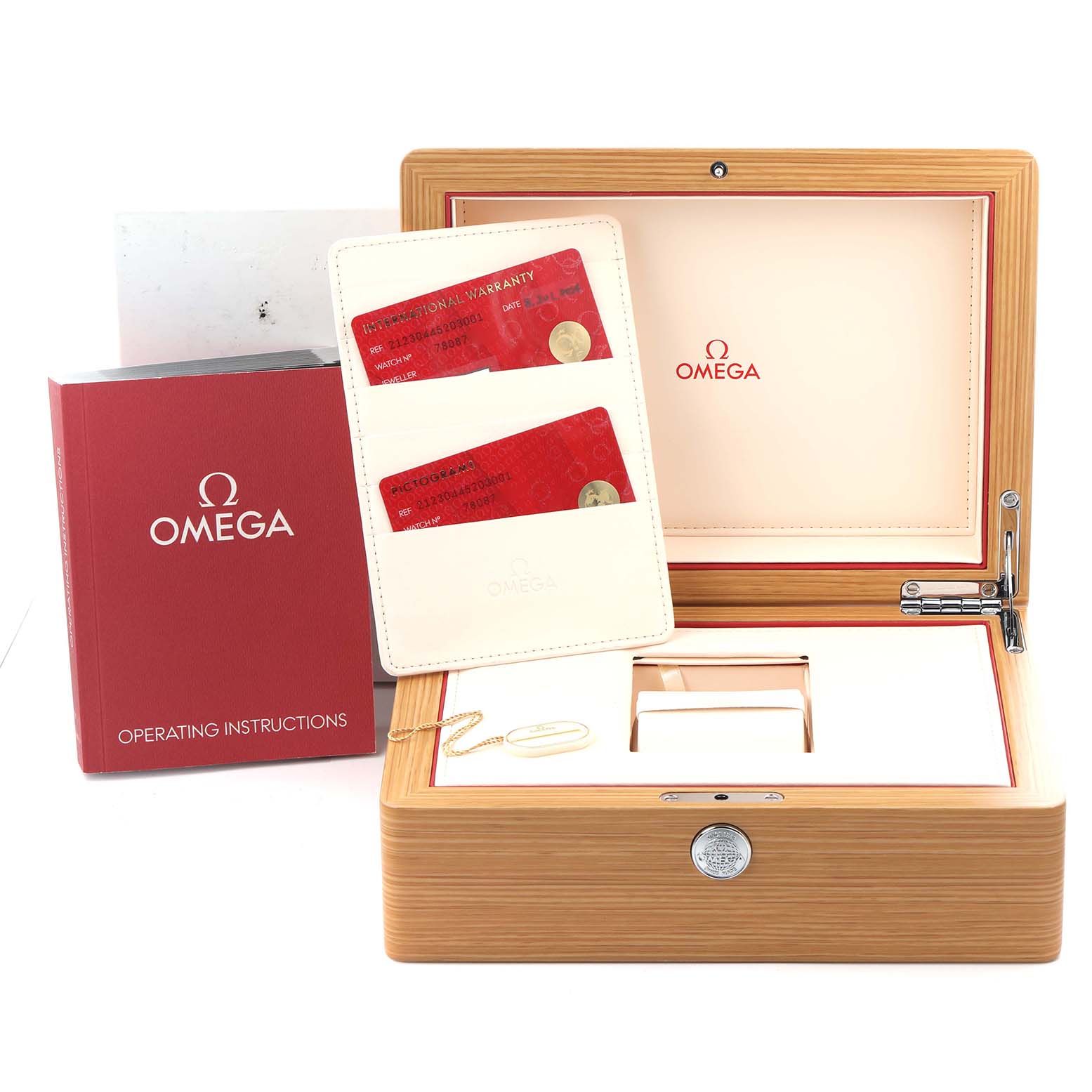 The image shows an Omega Seamaster 212.30.44.52.03.001 Men
s Stainless Steel Blue Dial 212.30.44.52.03.001 Men
s Stainless Steel Blue Dial watch box open with warranty cards, operating instructions, and a cardholder.