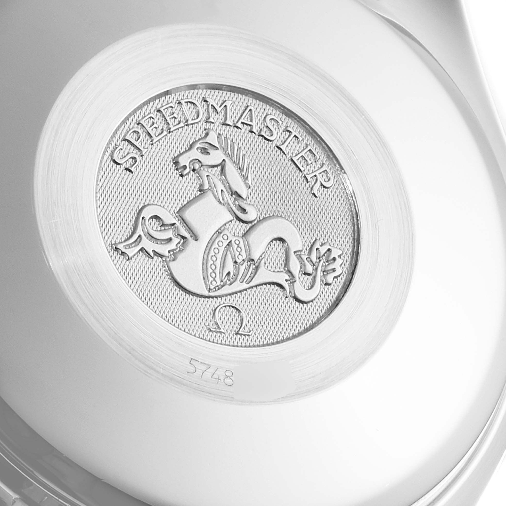 The image shows the case back of an Omega Speedmaster 3513.50.00 Men
s Stainless Steel Black Dial 3513.50.00 Men
s Stainless Steel Black Dial watch featuring the engraved logo.