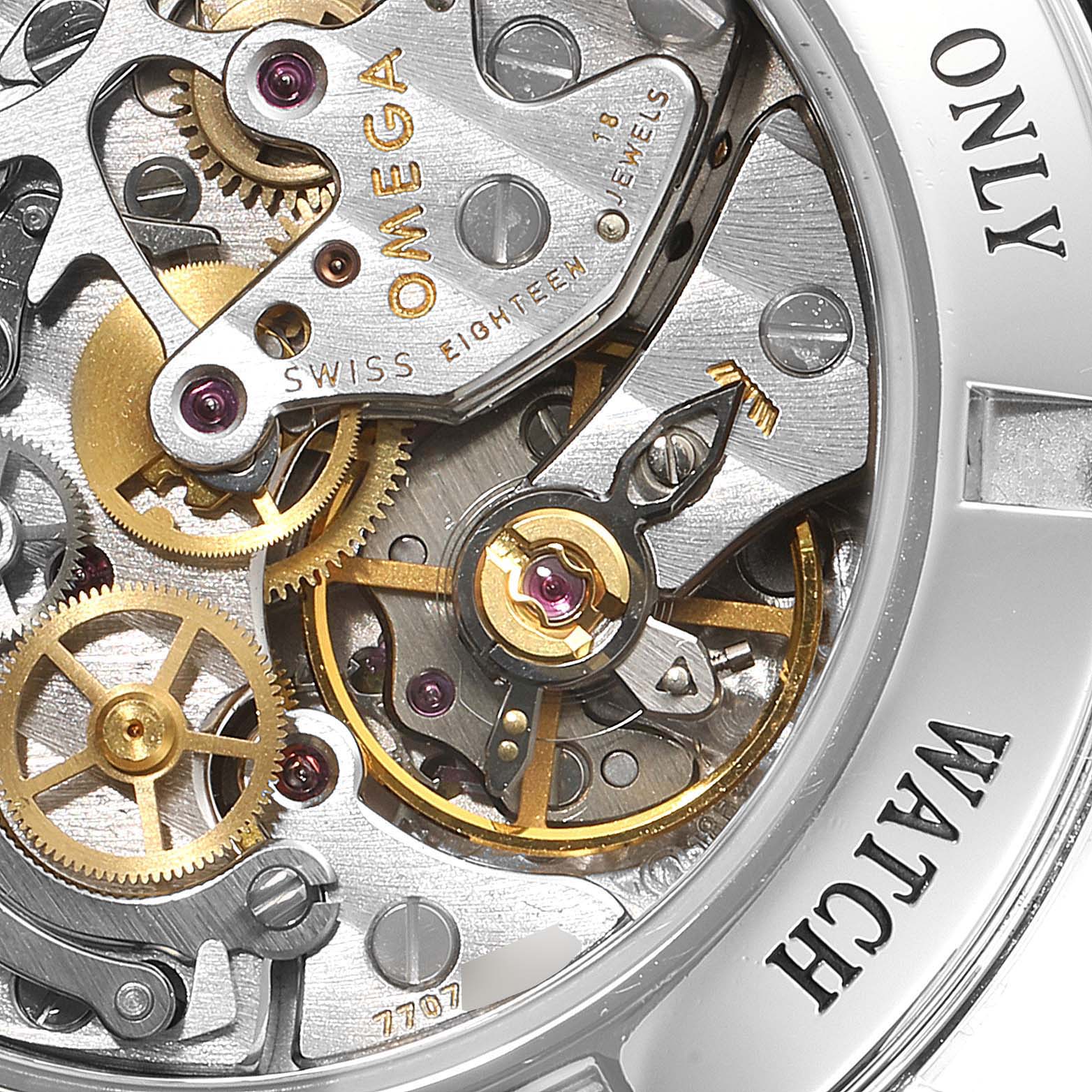 The image shows a close-up view of the internal movement and gears of an Omega Speedmaster 3573.50.00 Men's Stainless Steel Black Dial 3573.50.00 Men's Stainless Steel Black Dial watch.