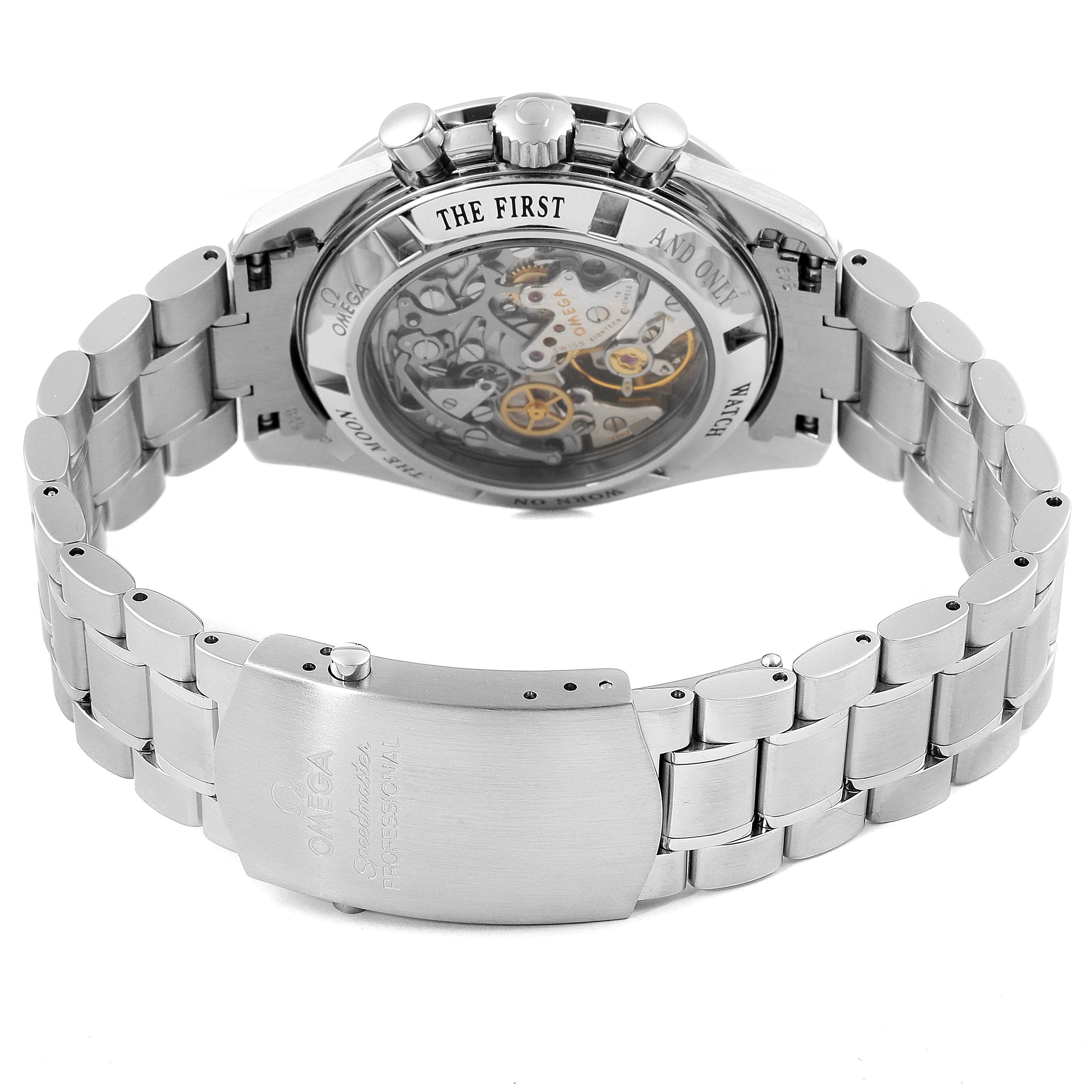 The image shows the backside and bracelet of an Omega Speedmaster 3573.50.00 Men's Stainless Steel Black Dial 3573.50.00 Men's Stainless Steel Black Dial watch, highlighting its transparent case back and clasp.