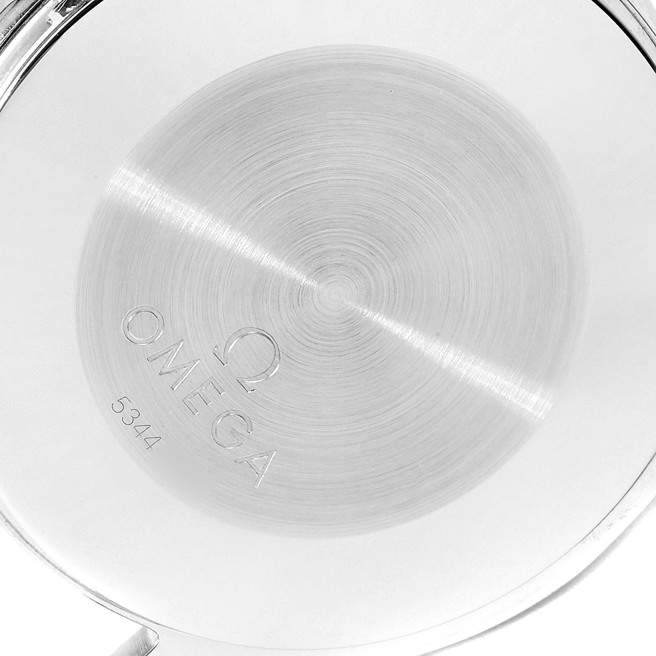 The image shows the back case of an Omega Speedmaster 3310.20.00 Men's Steel and Gold (two tone) White Dial 3310.20.00 Men's Steel and Gold (two tone) White Dial watch, featuring the brand name and a serial number.