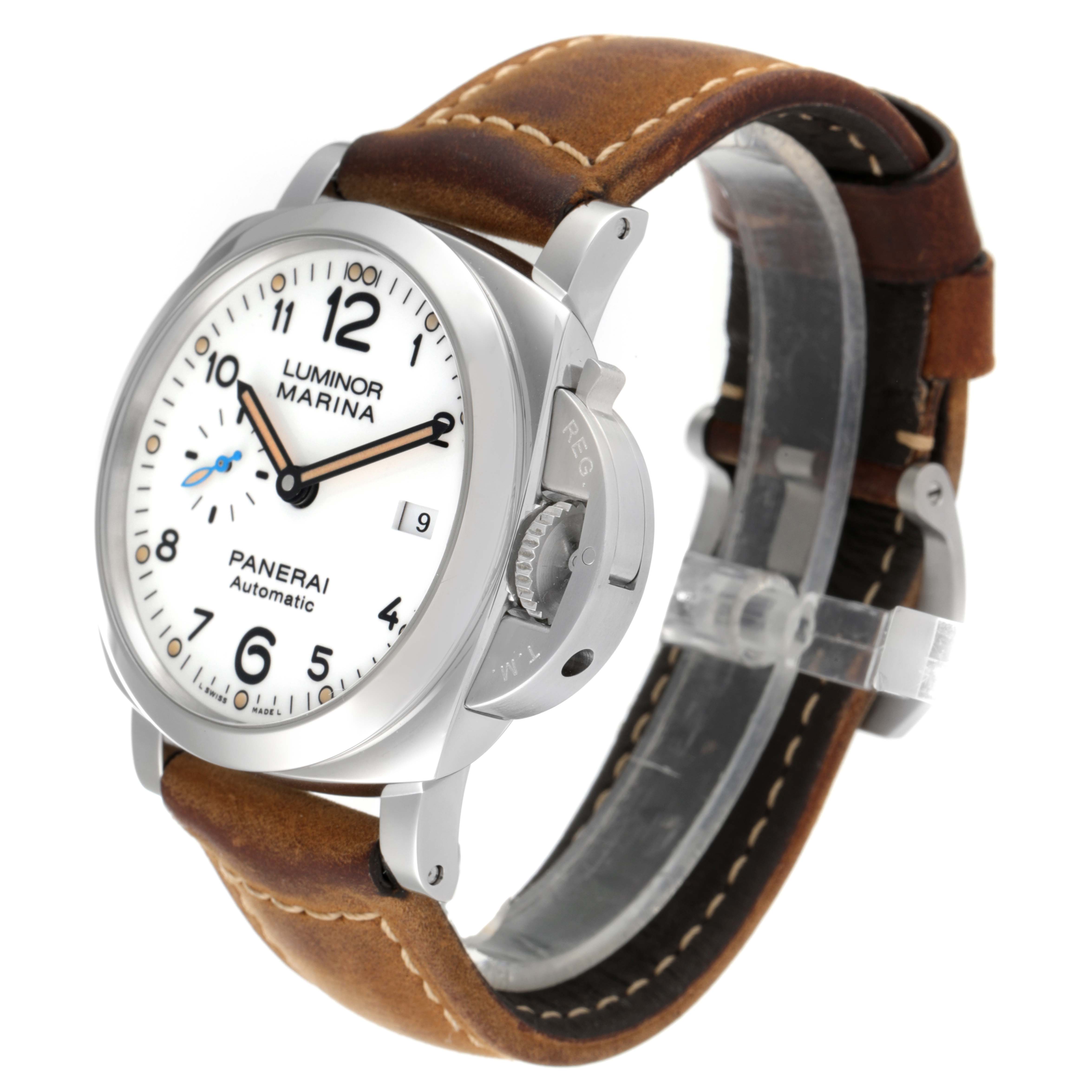 The image shows a Panerai Luminor PAM01499 Men
s Stainless Steel White Dial PAM01499 Men
s Stainless Steel White Dial Marina watch at an angle highlighting the face, crown guard, and brown leather strap.