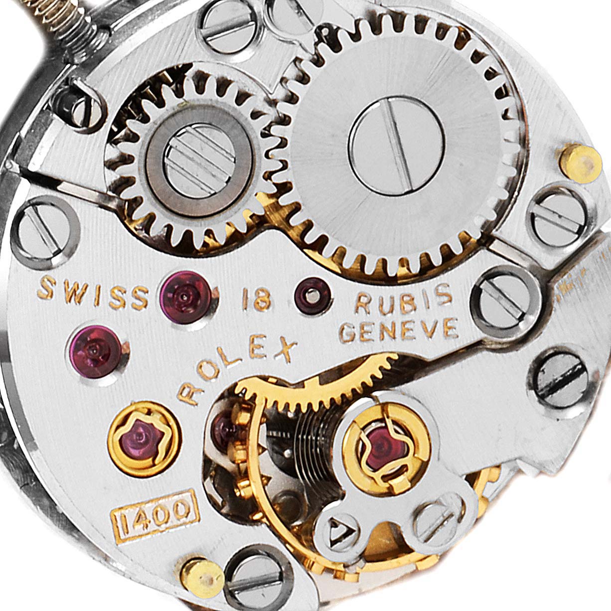 This is a close-up view of the Rolex Cocktail  Women's White Gold Silver Dial  Women's White Gold Silver Dial model watch movement, showcasing gears and mechanical parts.
