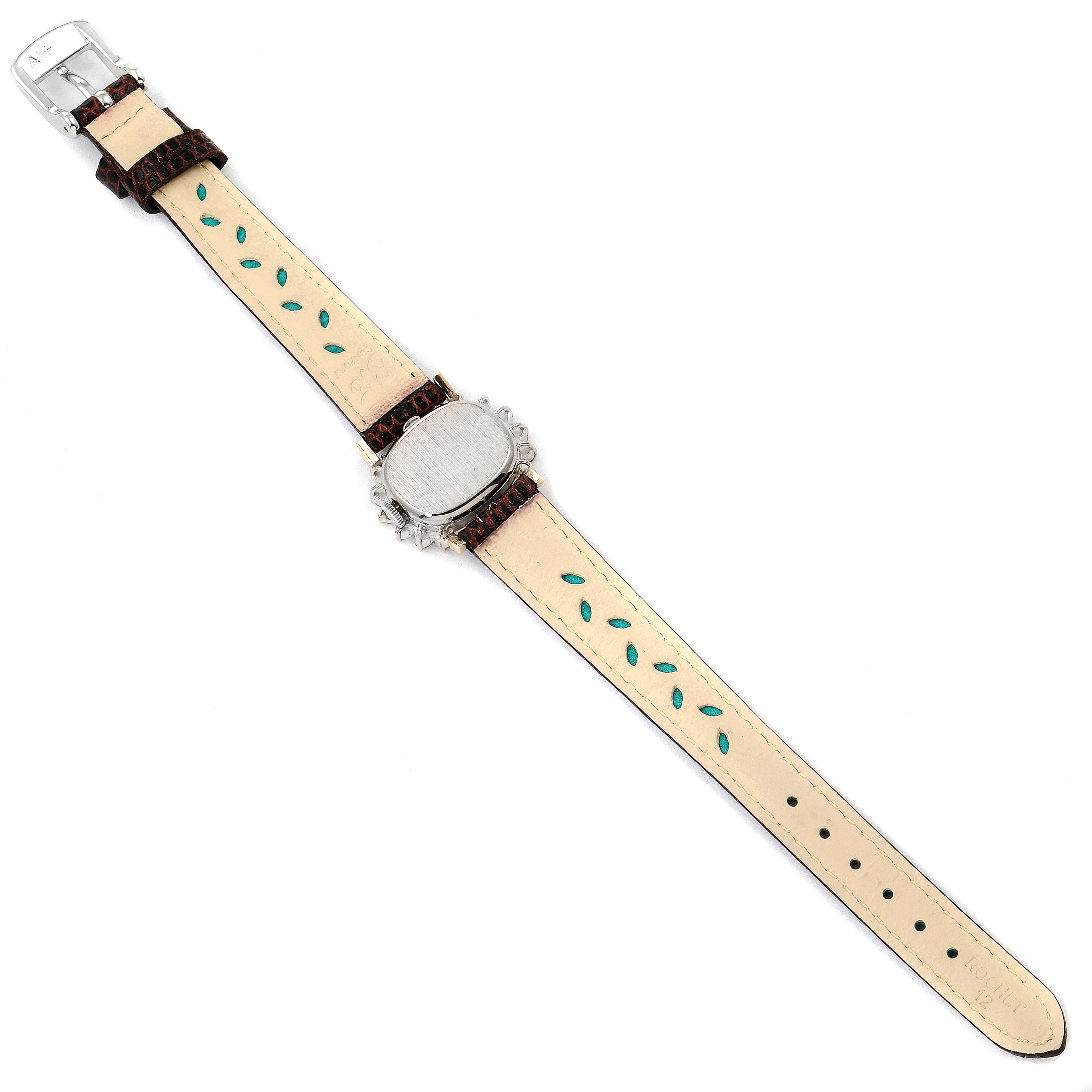 The image shows the back of the Rolex Cocktail  Women's White Gold Silver Dial  Women's White Gold Silver Dial model watch, including the strap and buckle, laid flat.