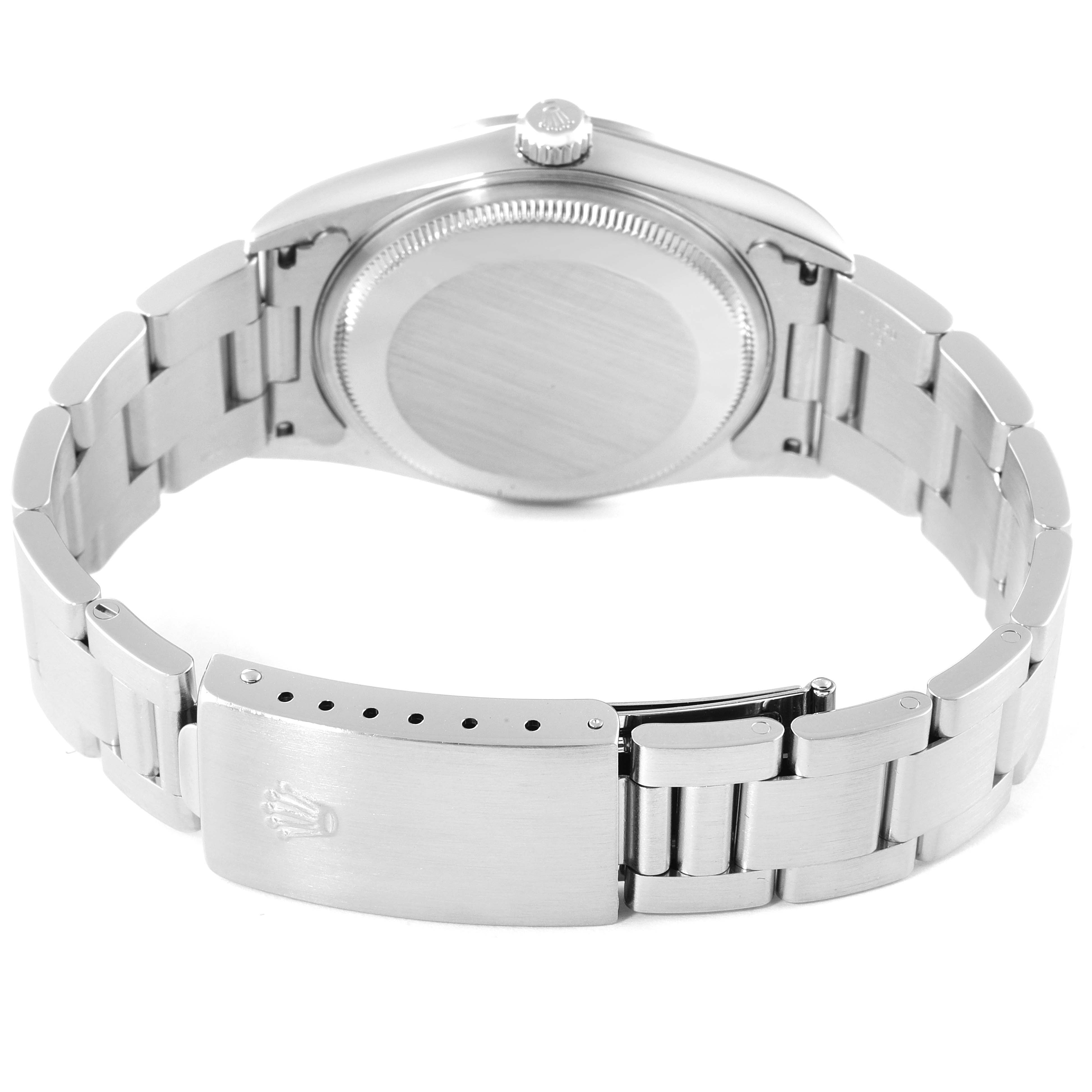 The image shows the backside of a Rolex Air-King 14000 Men's Stainless Steel Blue Dial 14000 Men's Stainless Steel Blue Dial watch, highlighting the case back and bracelet clasp.