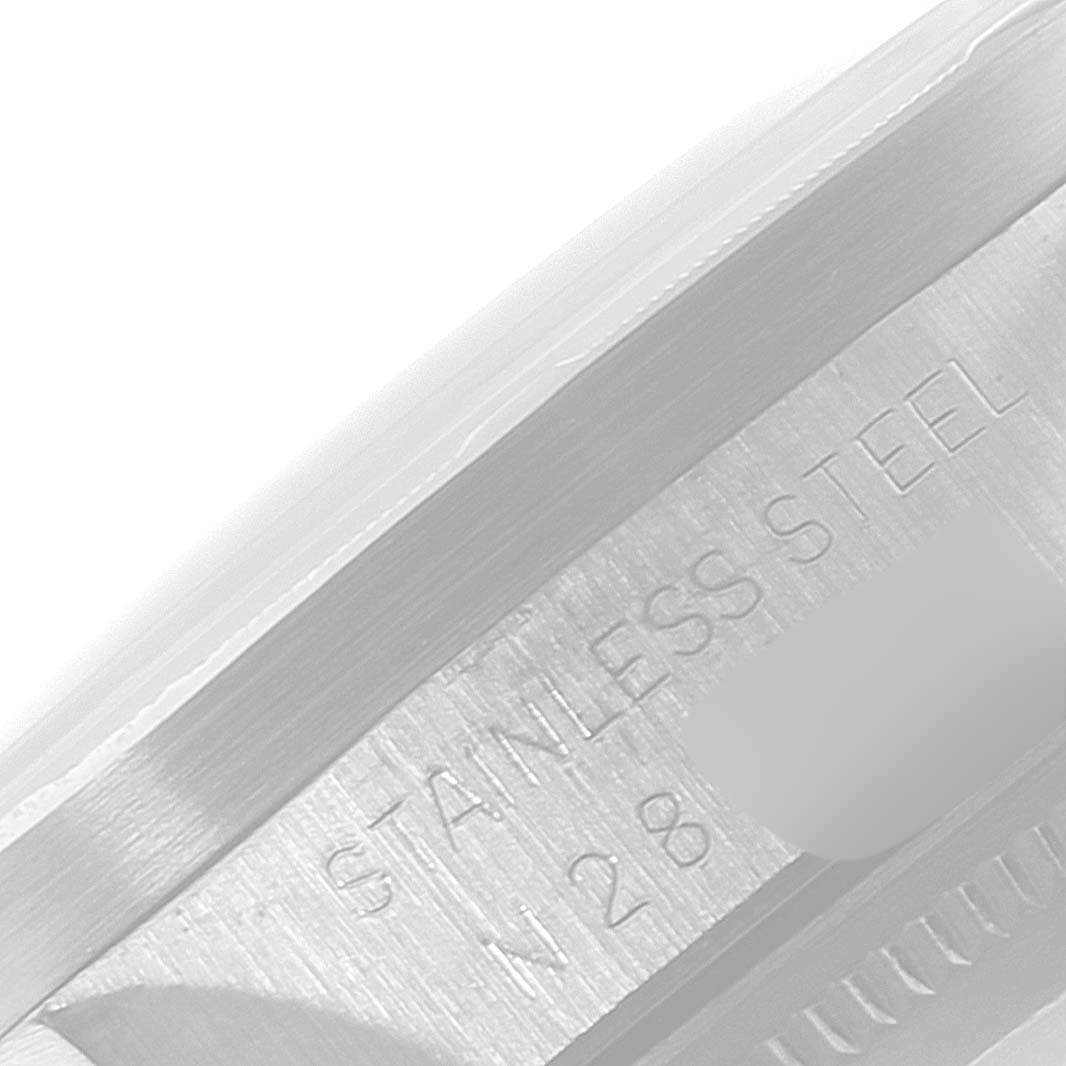 This close-up image shows the stainless steel casing of a Rolex Air-King 14010 Men's Stainless Steel Silver Dial 14010 Men's Stainless Steel Silver Dial watch, highlighting the engraved text.