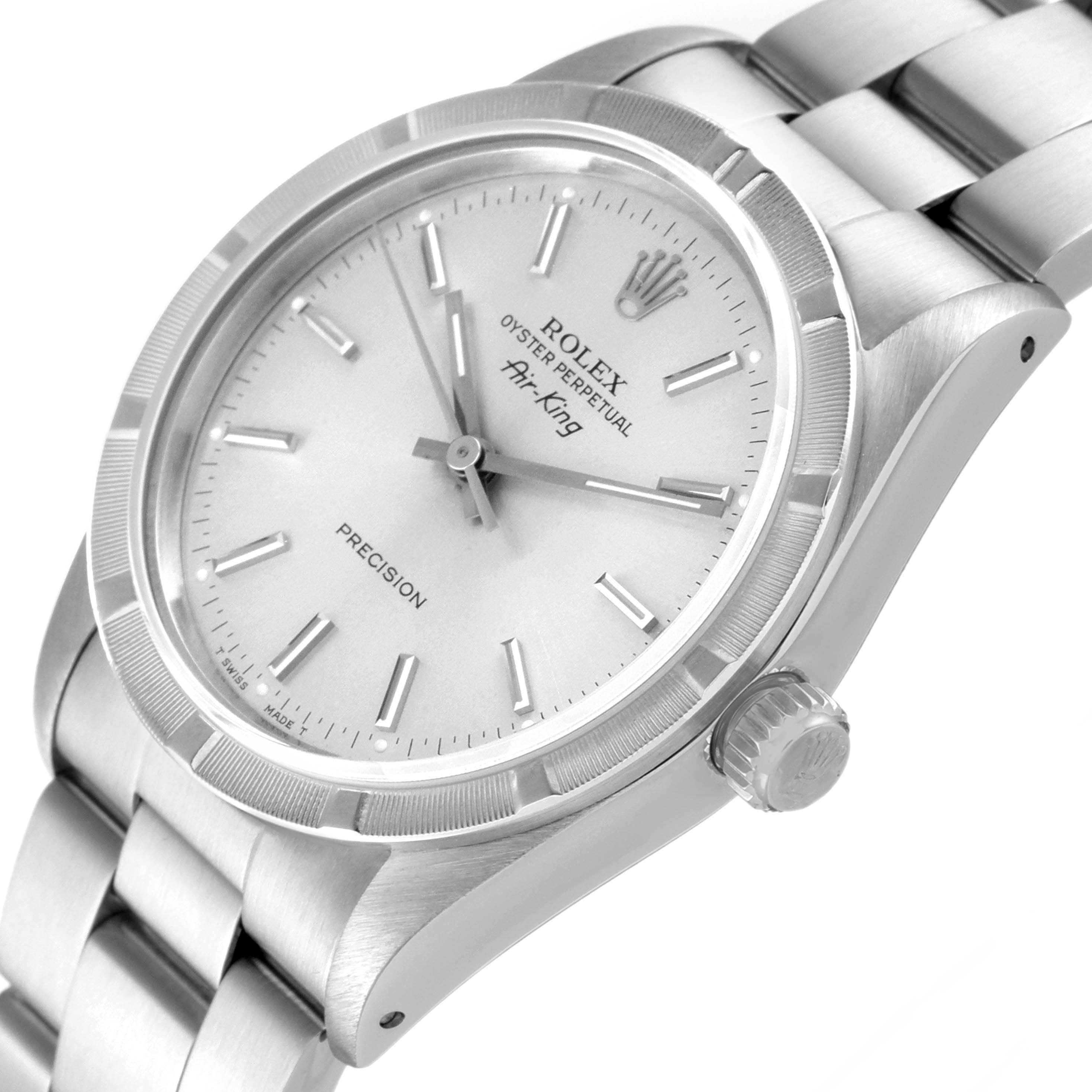 This image shows a Rolex Air-King 14010 Men's Stainless Steel Silver Dial 14010 Men's Stainless Steel Silver Dial watch at a slight angle, highlighting the dial, bezel, and part of the metal bracelet.