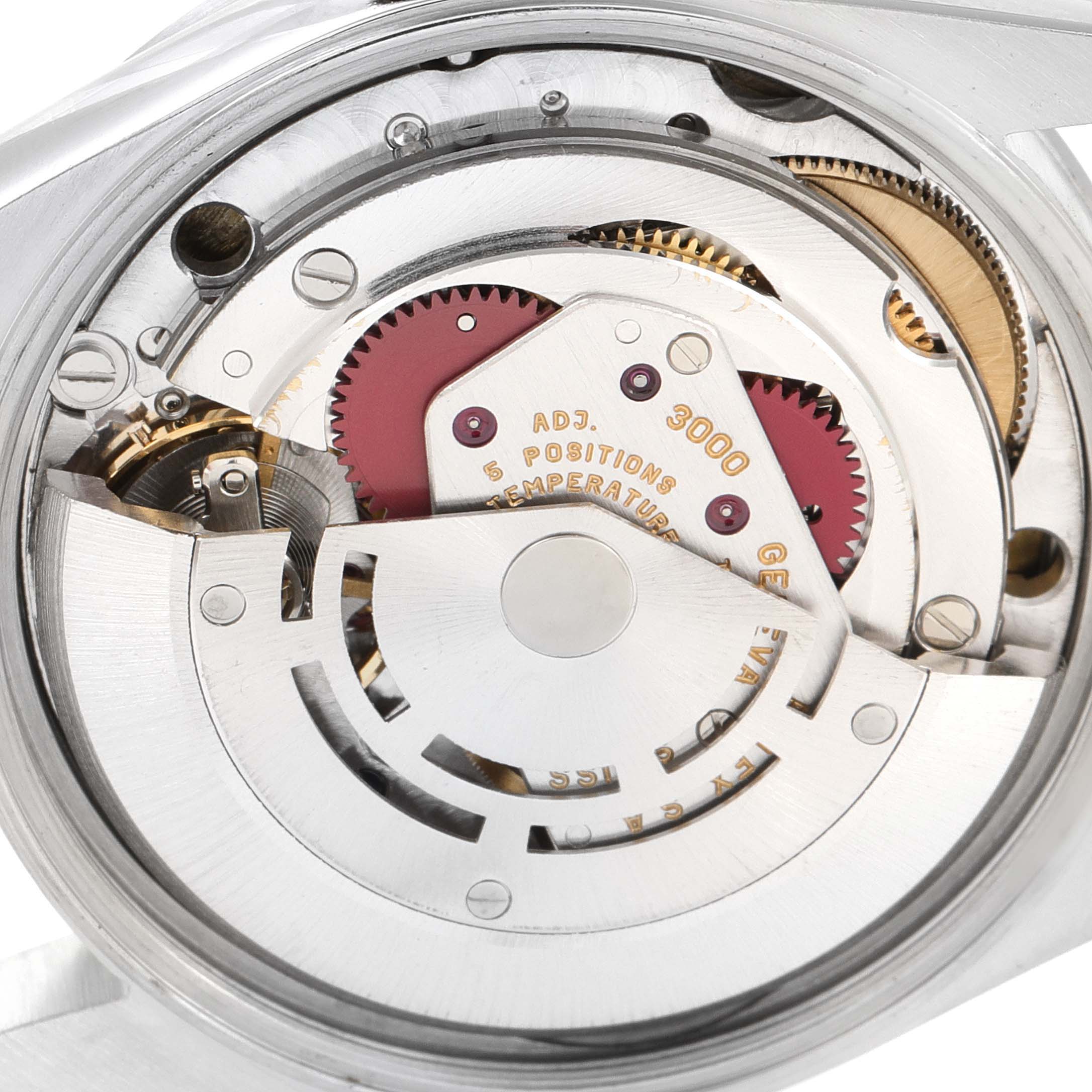 This image shows a close-up view of the movement and internal components of a Rolex Air-King 14000 Men's Stainless Steel White Dial 14000 Men's Stainless Steel White Dial watch.