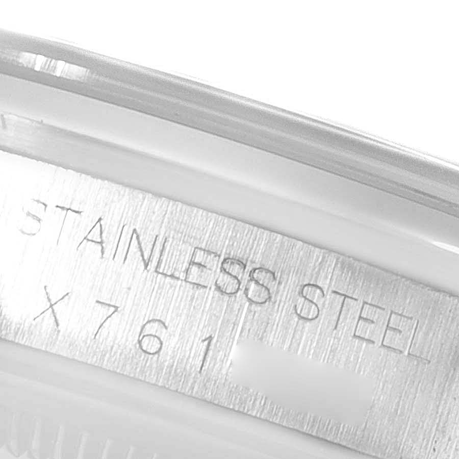 This image shows a close-up of the stainless steel case back with inscribed text of a Rolex Air-King 14000 Men's Stainless Steel White Dial 14000 Men's Stainless Steel White Dial watch.
