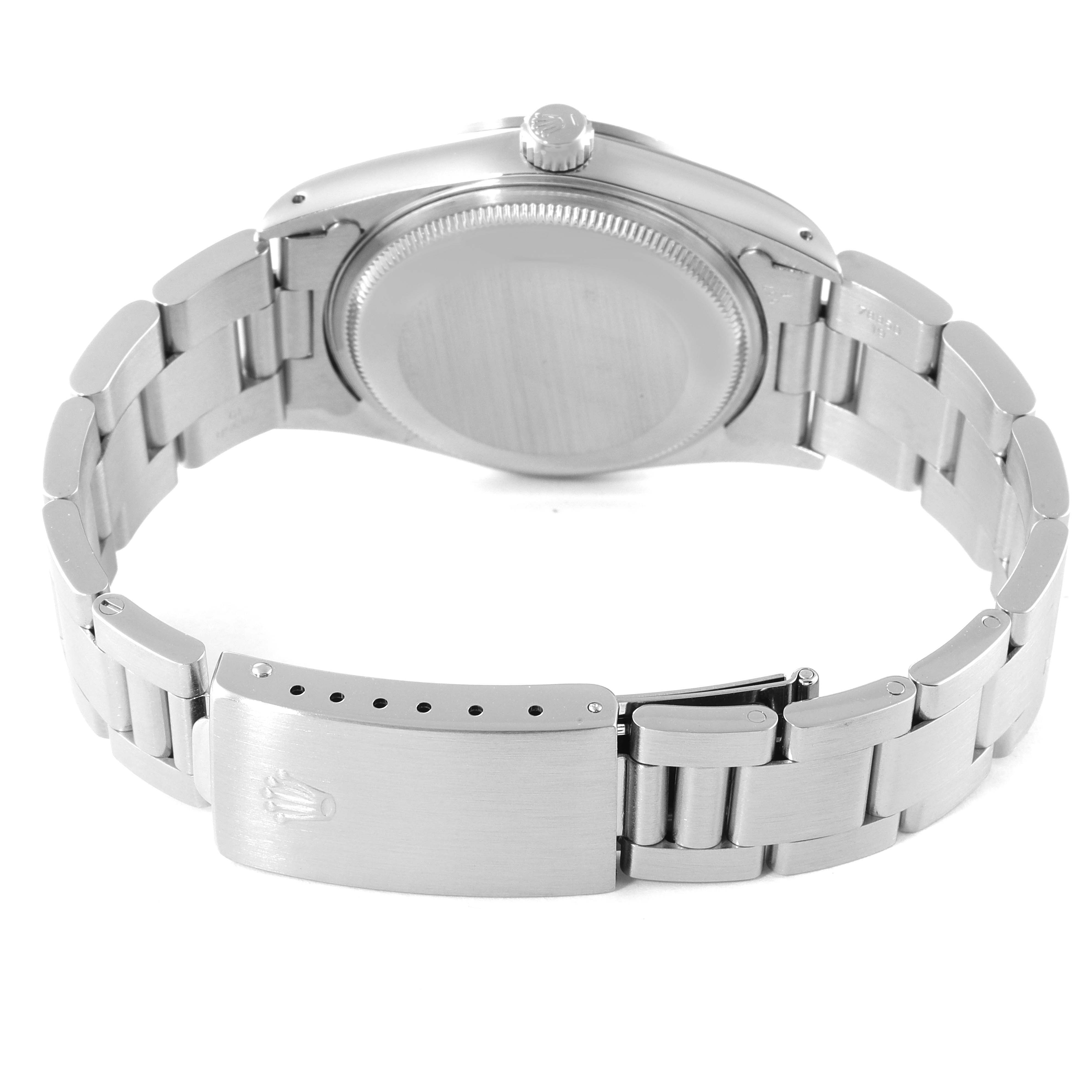 The image shows the back and bracelet of a Rolex Air-King 14000 Men's Stainless Steel White Dial 14000 Men's Stainless Steel White Dial watch, displaying its clasp and caseback.