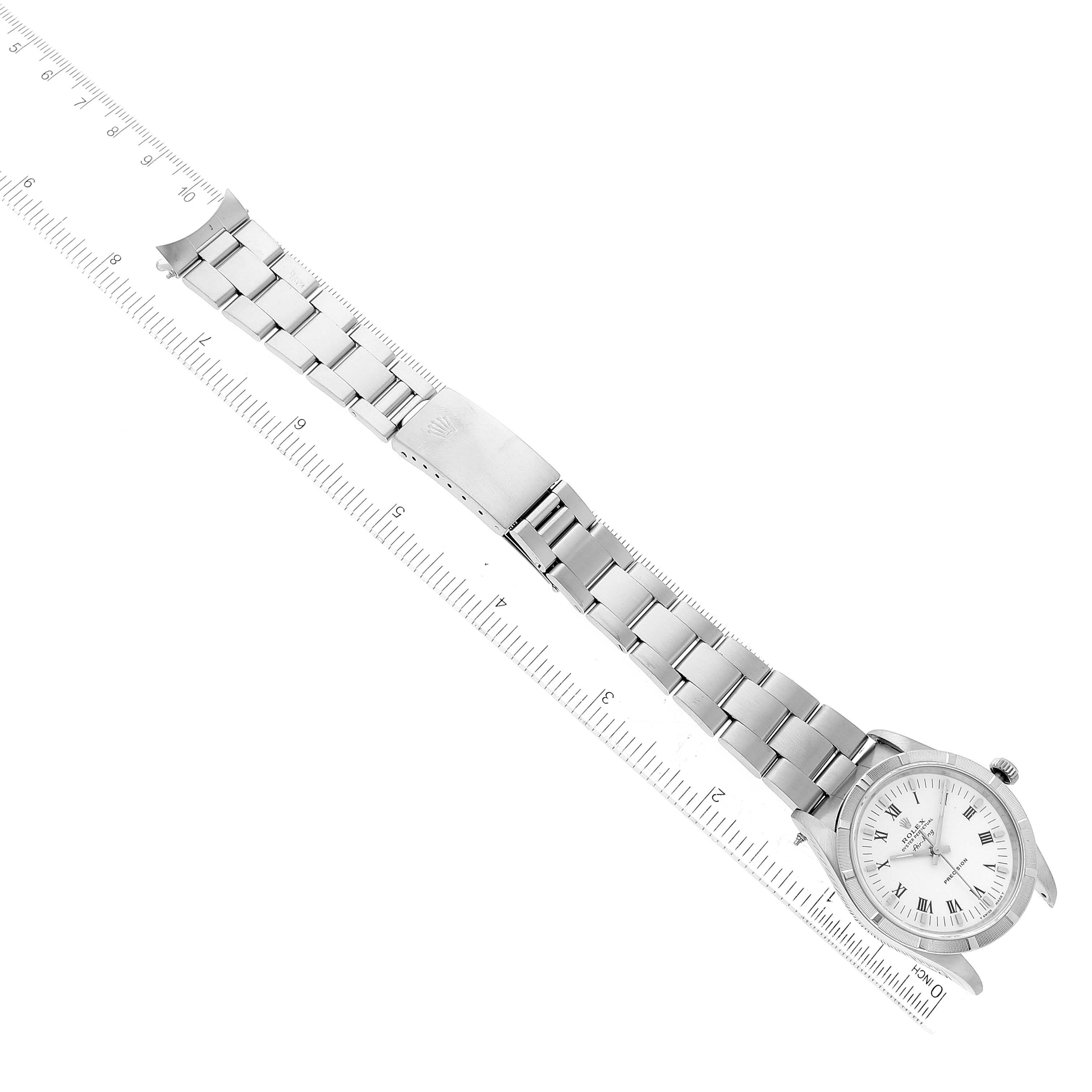 The image shows a Rolex Air-King 14010 Men's Stainless Steel White Dial 14010 Men's Stainless Steel White Dial watch with a top-down view of the face and metal bracelet, along with a measuring ruler.