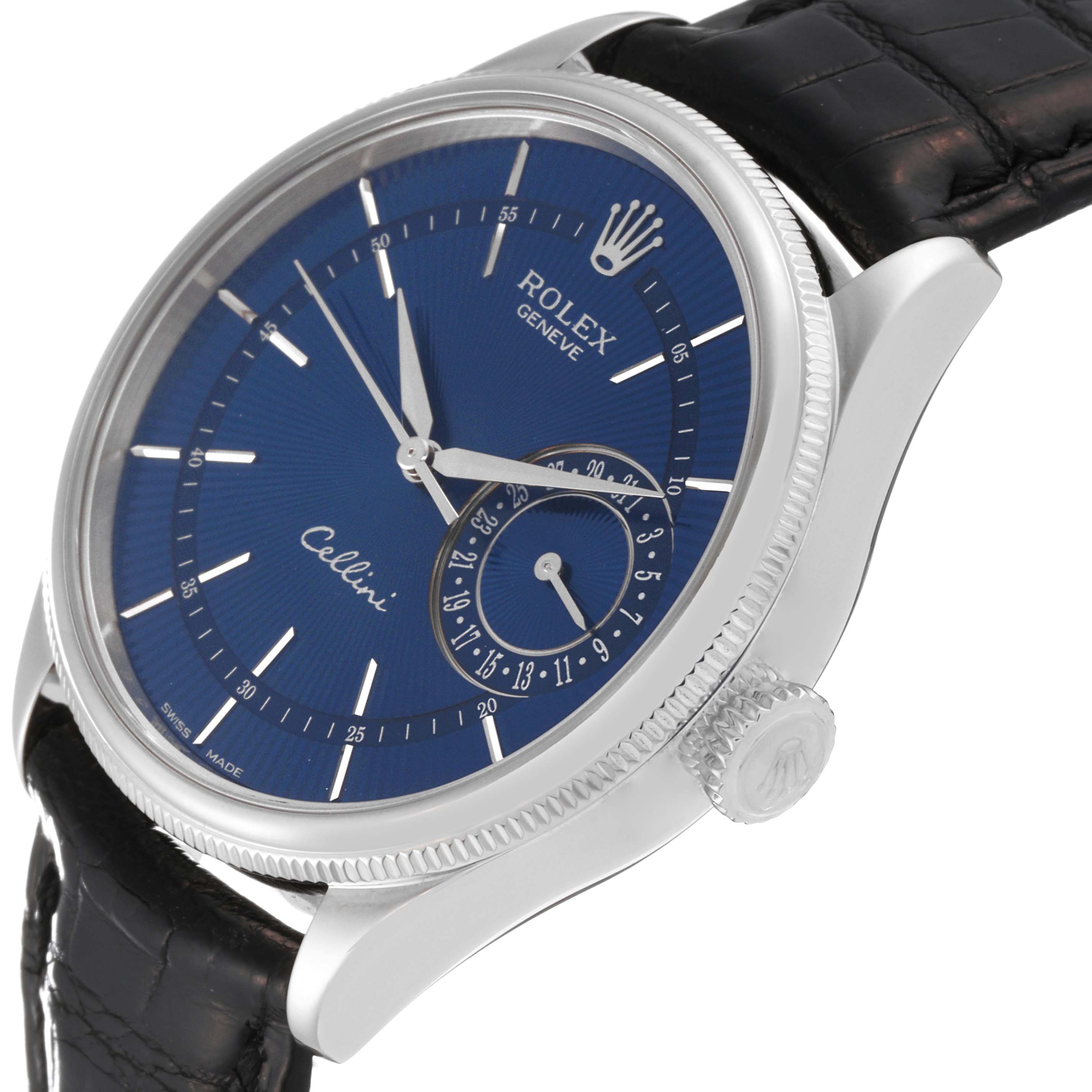 The Rolex Cellini 50519 Men
s White Gold Blue Dial 50519 Men
s White Gold Blue Dial watch is shown at an angle, displaying the dial, bezel, crown, and black leather strap.