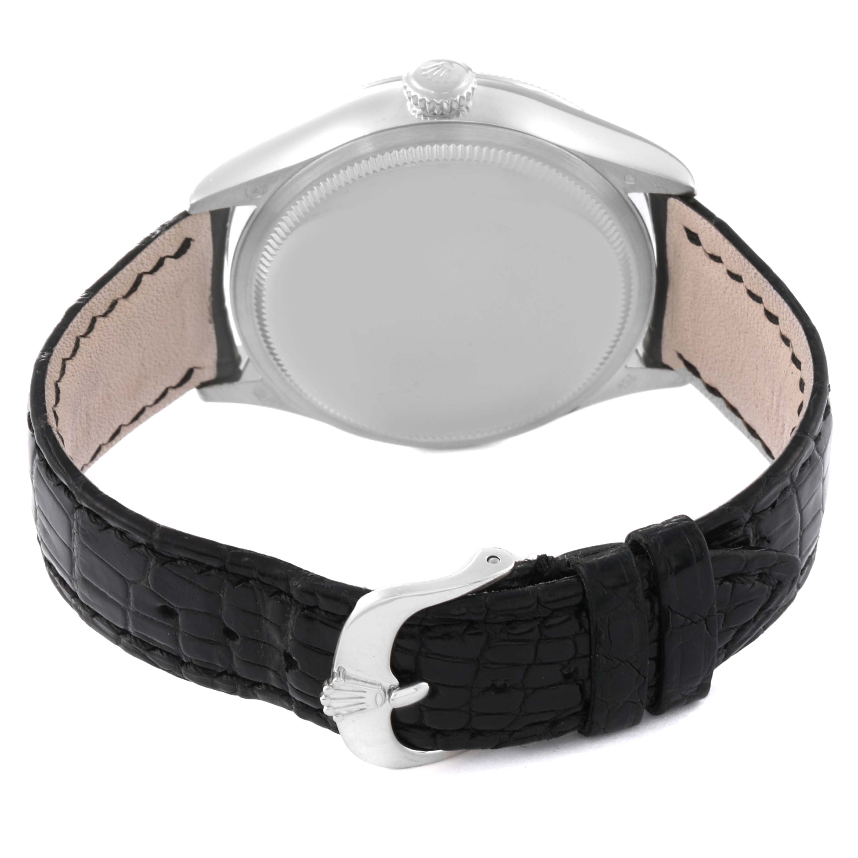 This image shows the back case and black leather strap of the Rolex Cellini 50519 Men
s White Gold Blue Dial 50519 Men
s White Gold Blue Dial watch.