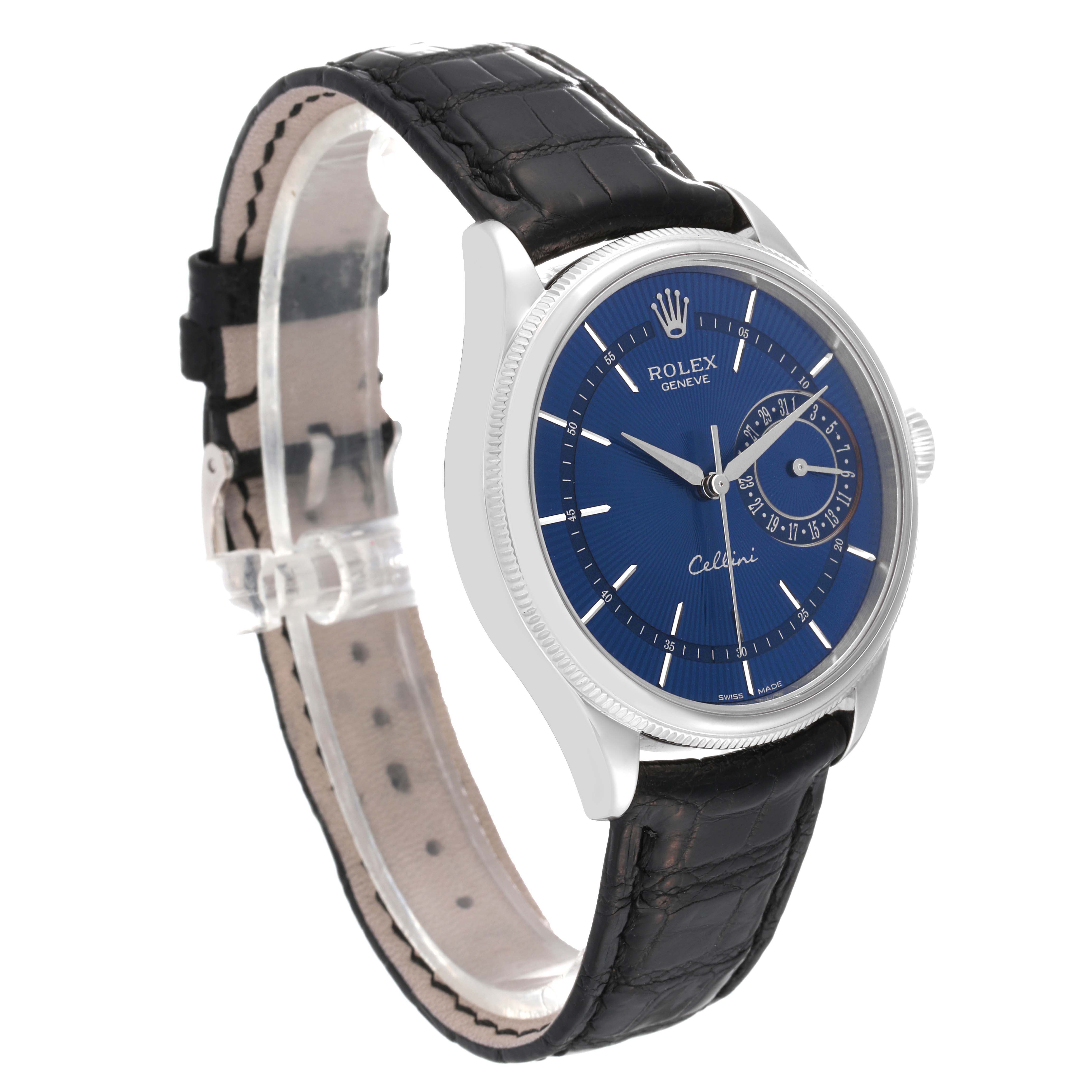 The Rolex Cellini 50519 Men
s White Gold Blue Dial 50519 Men
s White Gold Blue Dial watch is shown at a slight angle, displaying its blue dial, silver case, and black leather strap.