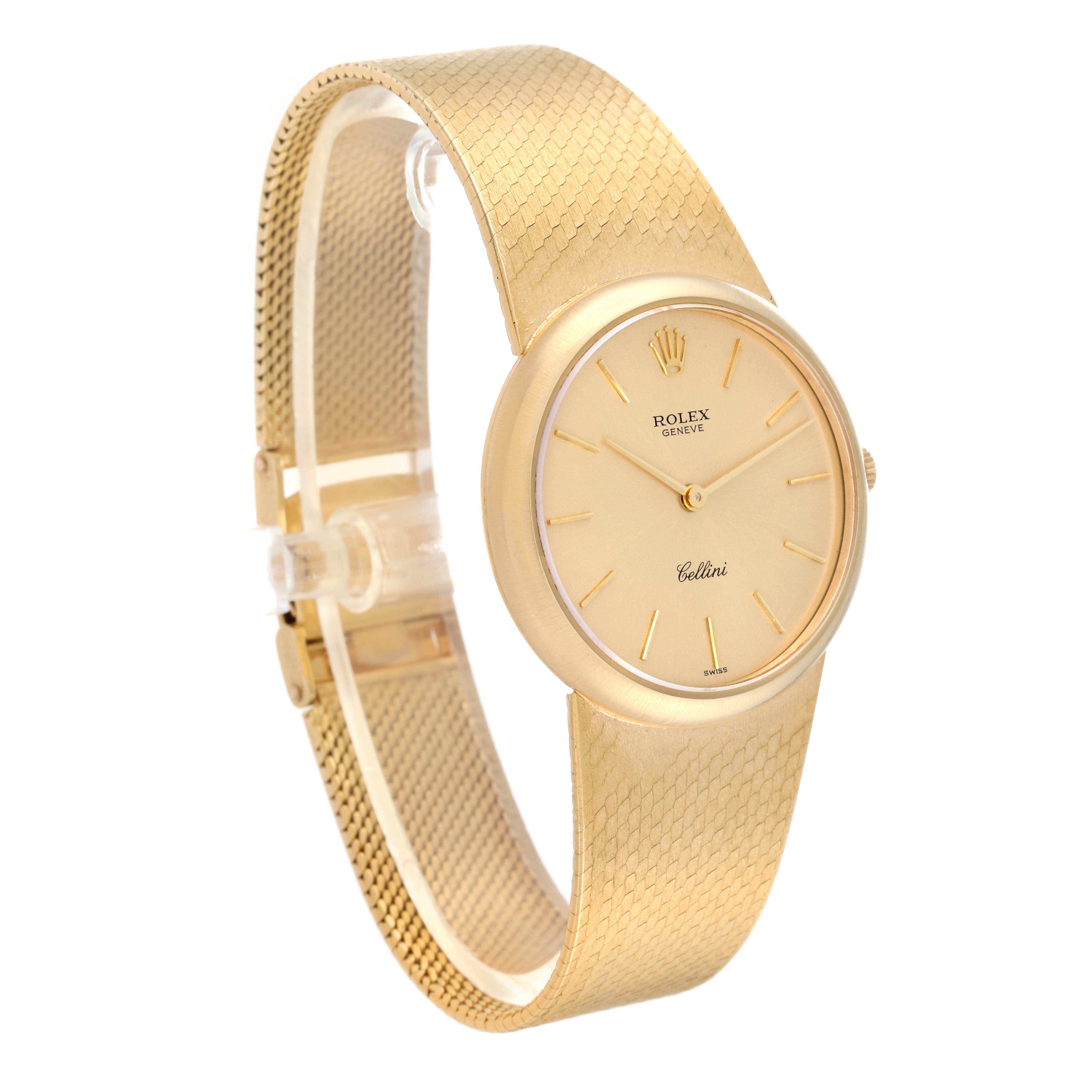 This image shows a side angle of a gold Rolex Cellini 653 Women's Yellow Gold Champagne Dial 653 Women's Yellow Gold Champagne Dial watch displaying its face, strap, and clasp.