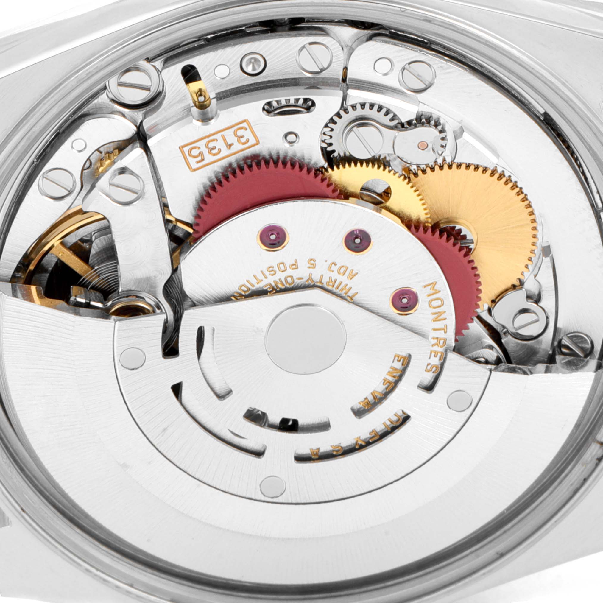 This image shows the movement and internal components of a Rolex Date 15223 Men's Steel and Gold (two tone) Champagne Dial 15223 Men's Steel and Gold (two tone) Champagne Dial model watch from a top-down angle.